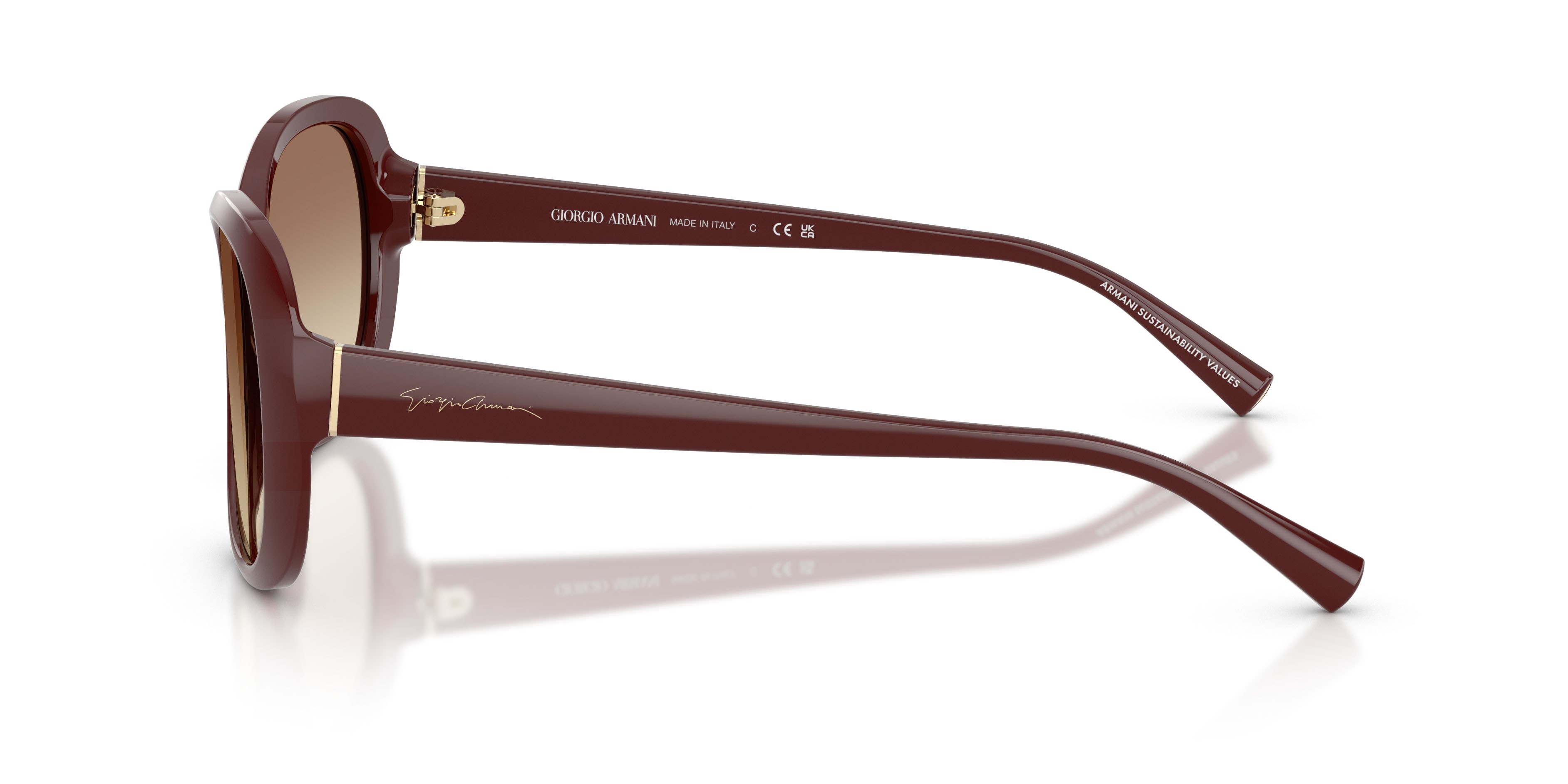 Occhiali da sole Giorgio Armani AR 8047 (639913) colore borgogna tinta unita forma rotondo lenti marrone sfumato