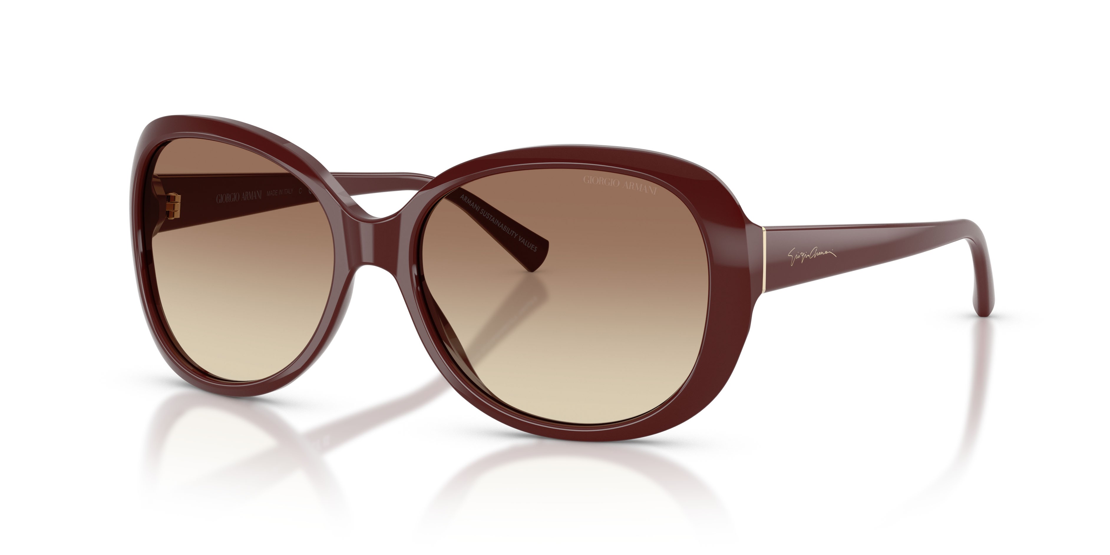 Occhiali da sole Giorgio Armani AR 8047 (639913) colore borgogna tinta unita forma rotondo lenti marrone sfumato
