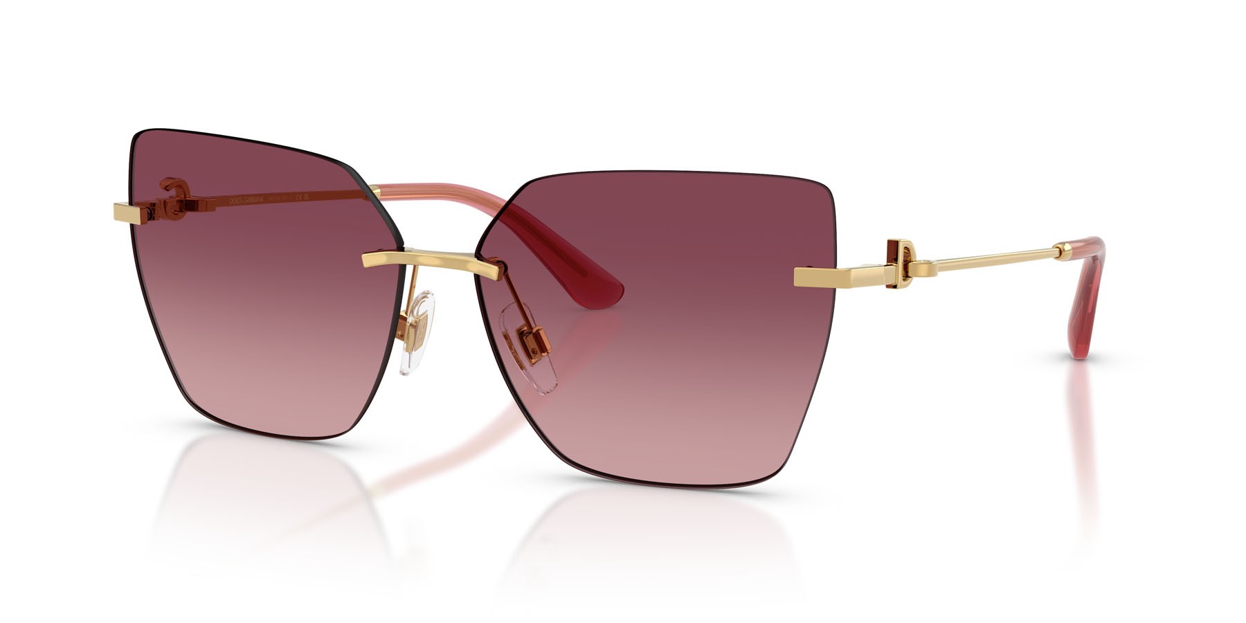 Occhiali da sole Dolce & Gabbana DG 2321 (02/8D) colore oro forma cat eye lenti rosa chiaro sfumato rosa