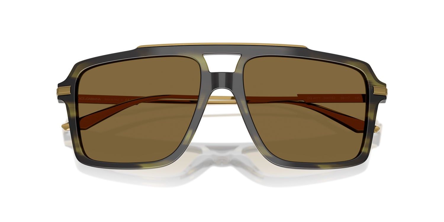 Occhiali da sole Dolce & Gabbana DG 4477 (3447S7) colore verde oliva striato forma aviator lenti marrone
