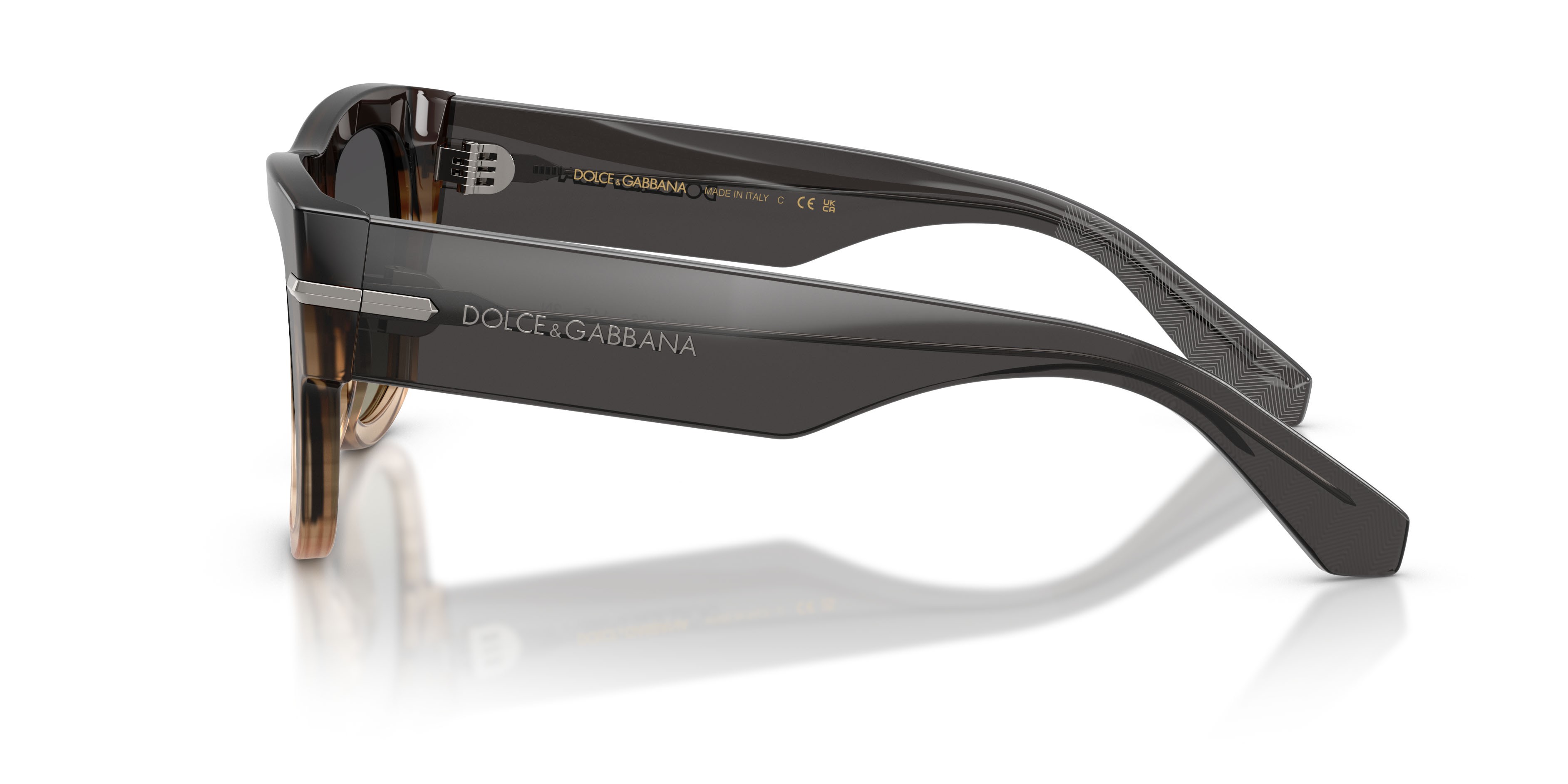 Occhiali da sole Dolce & Gabbana DG 4484 (348411) colore grigio striato sfumato forma quadrato lenti sfumato grigio