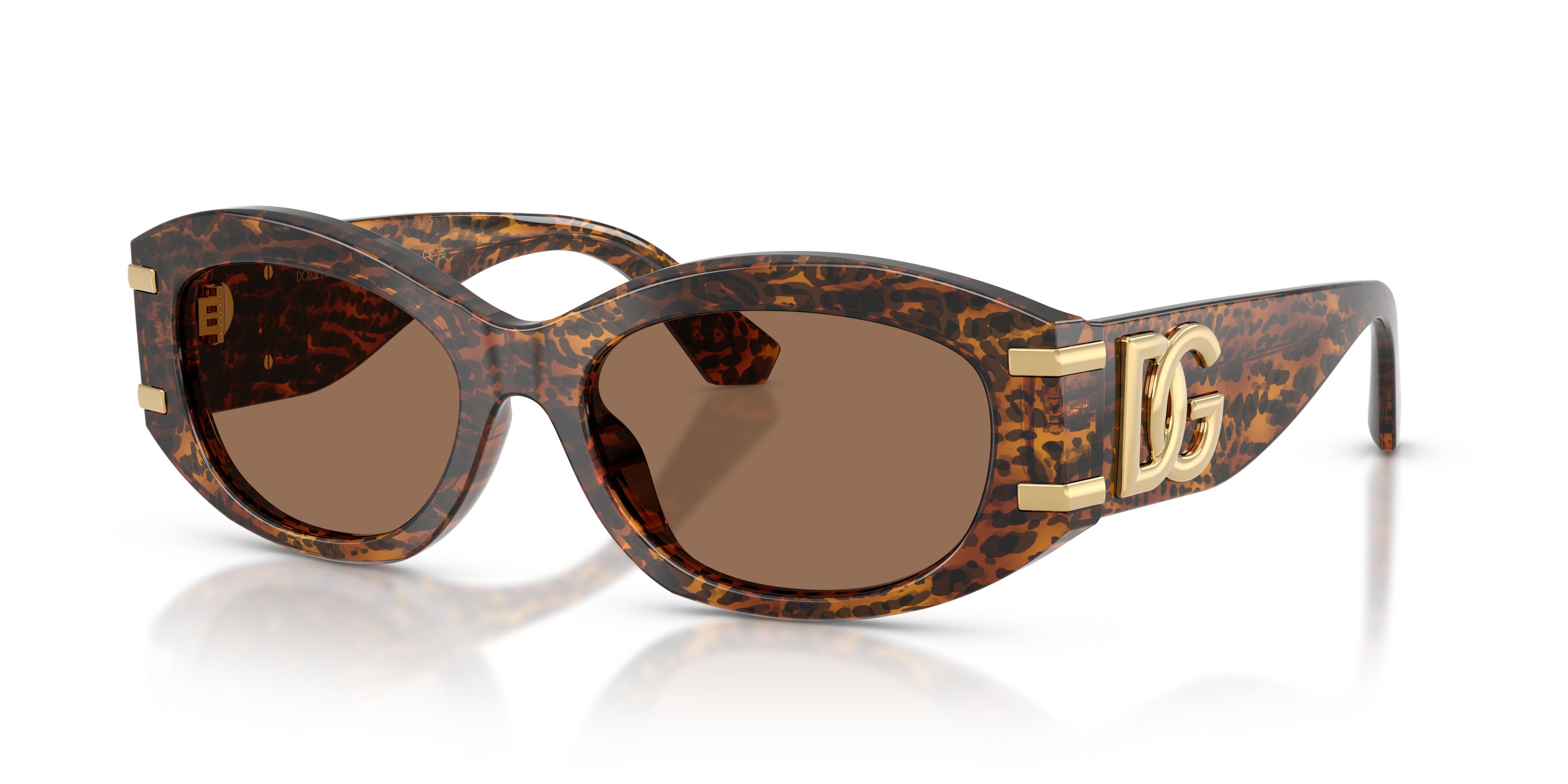 Occhiali da sole Dolce & Gabbana DG 4502 (347073) colore leo transparent forma ovale lenti marrone scuro
