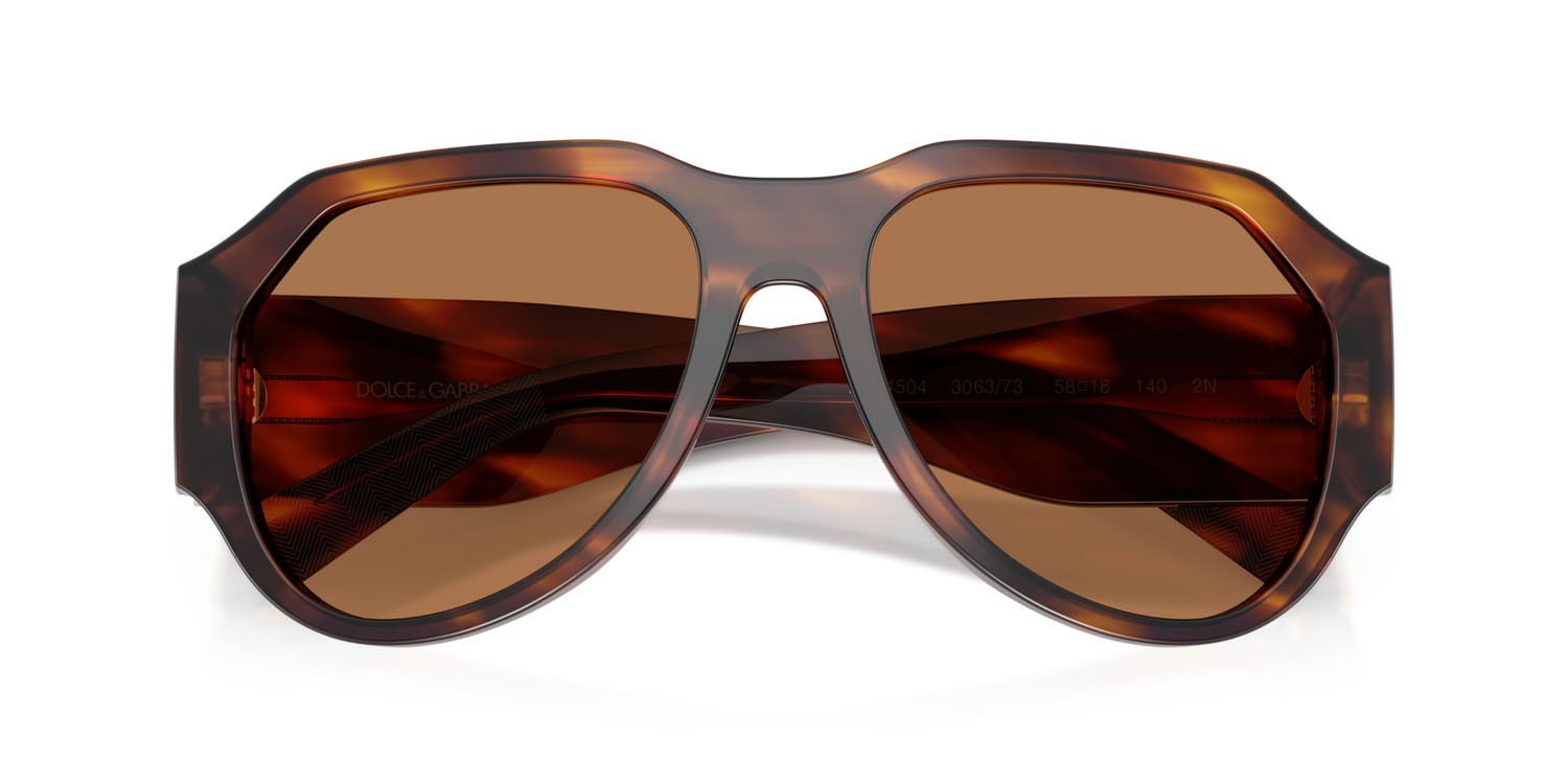 Occhiali da sole Dolce & Gabbana DG 4504 (306373) colore striato marrone forma aviator lenti bronzo
