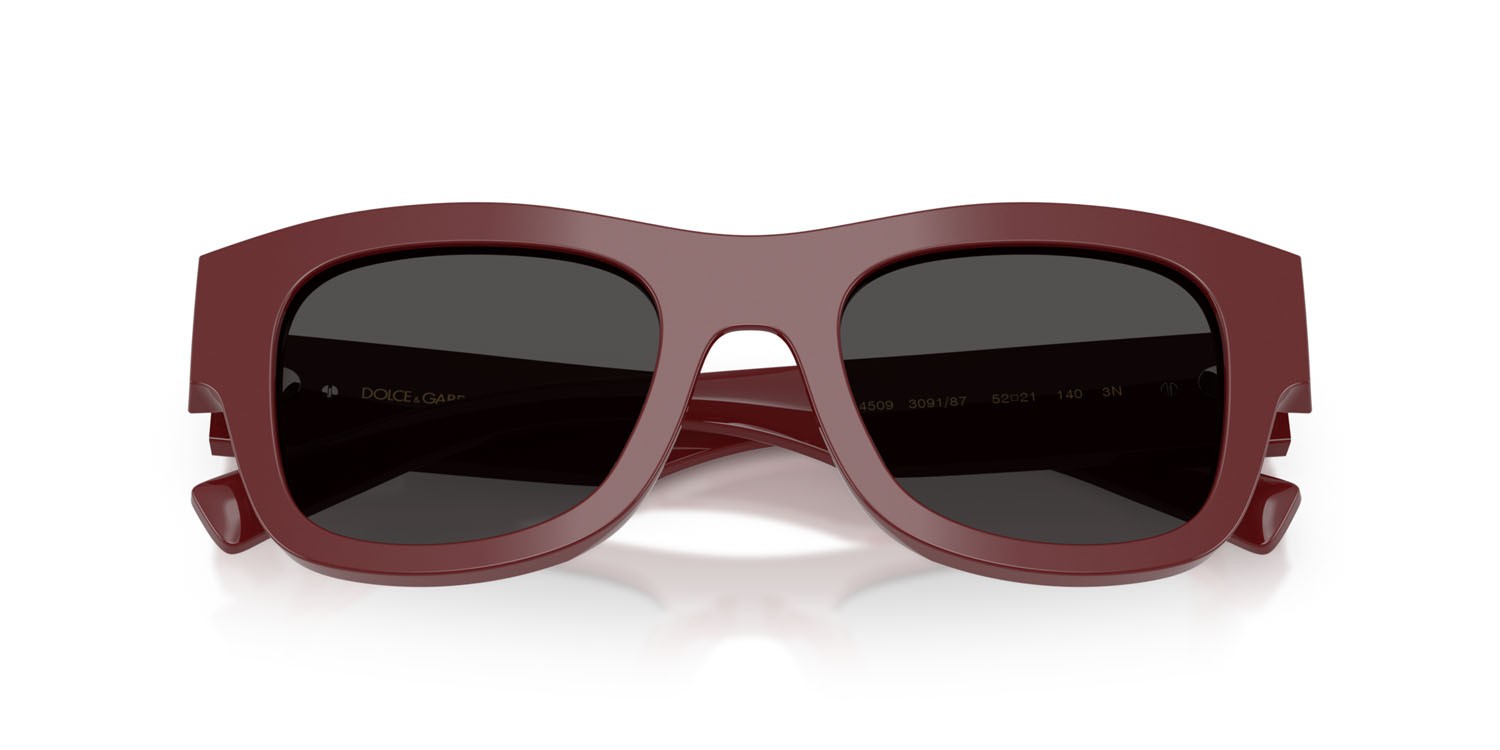 Occhiali da sole Dolce & Gabbana DG 4509 (309187) colore bordeaux forma quadrato lenti grigio scuro