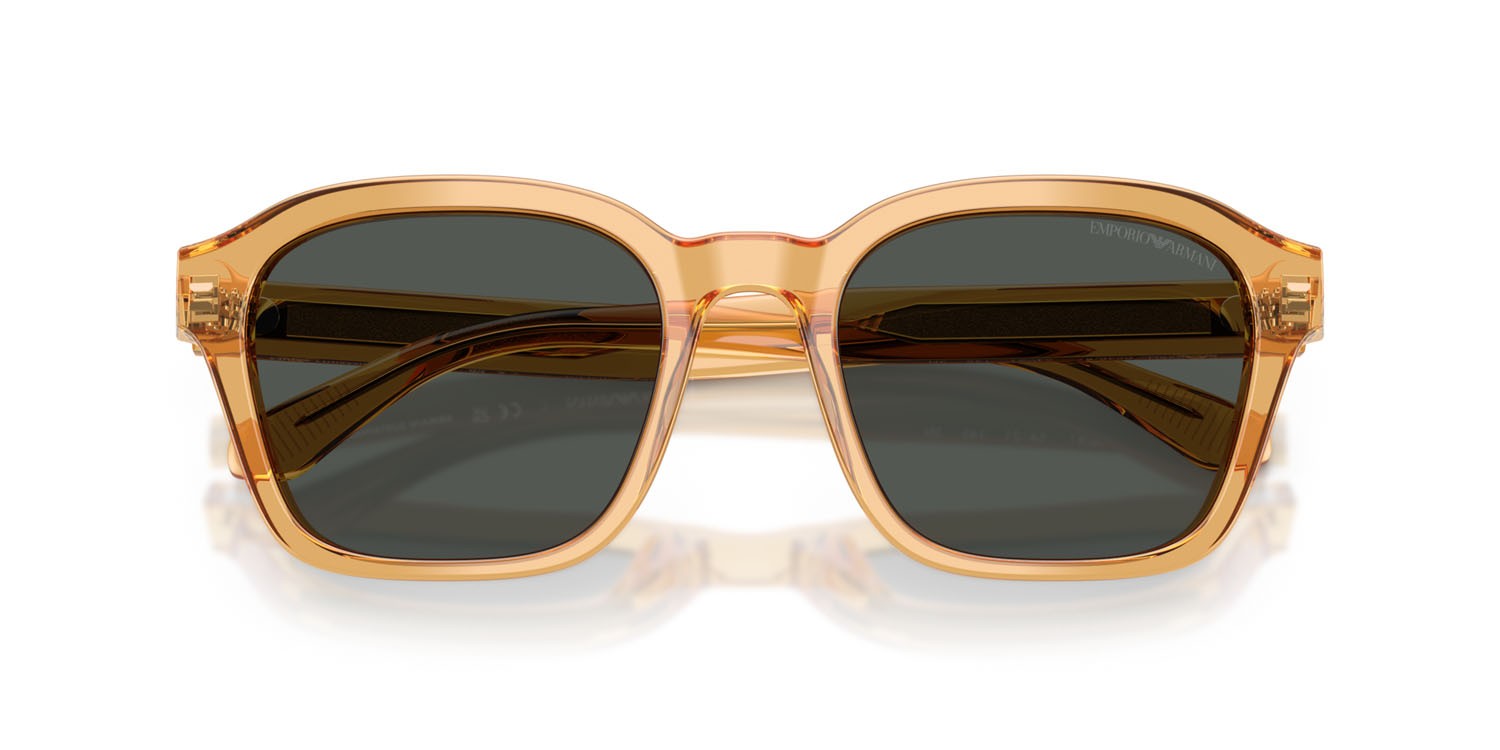 Occhiali da sole Emporio Armani EA 4245U (624687) colore trasparente giallo lucido forma irregolare lenti grigio scuro