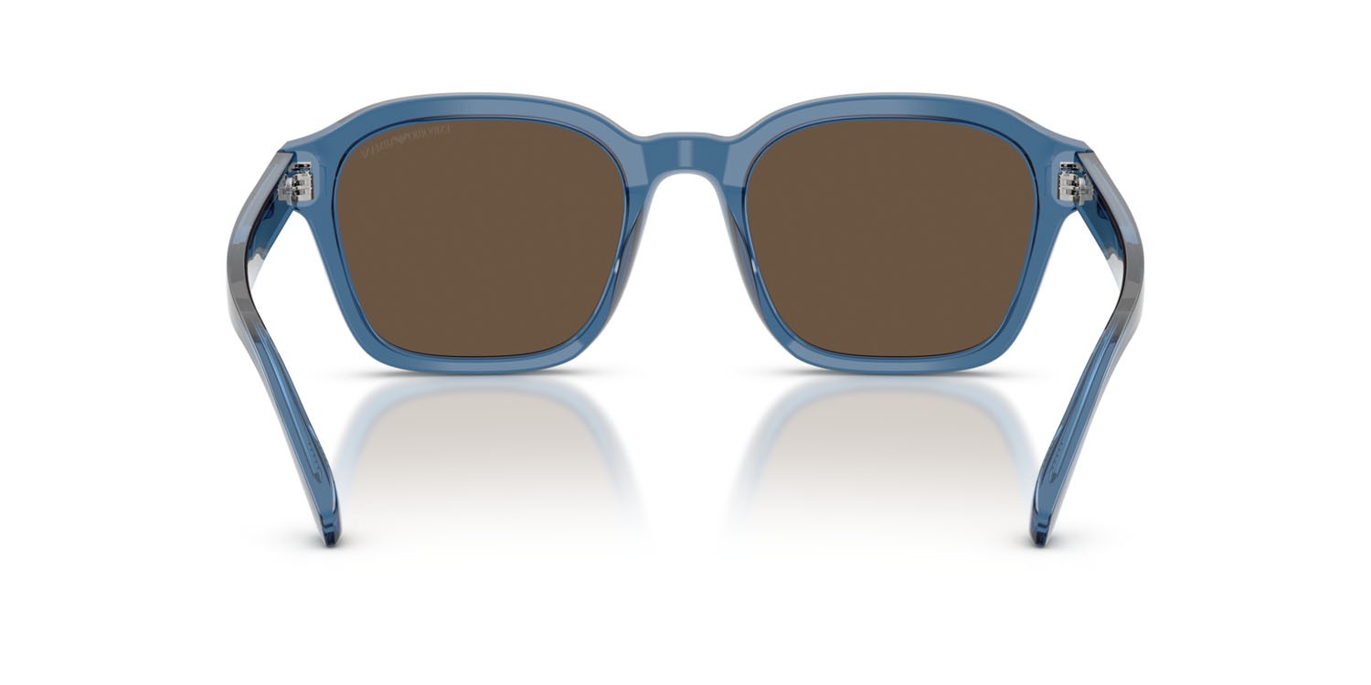 Occhiali da sole Emporio Armani EA 4245U (624787) colore blu trasparente lucido forma irregolare lenti marrone tinta unita