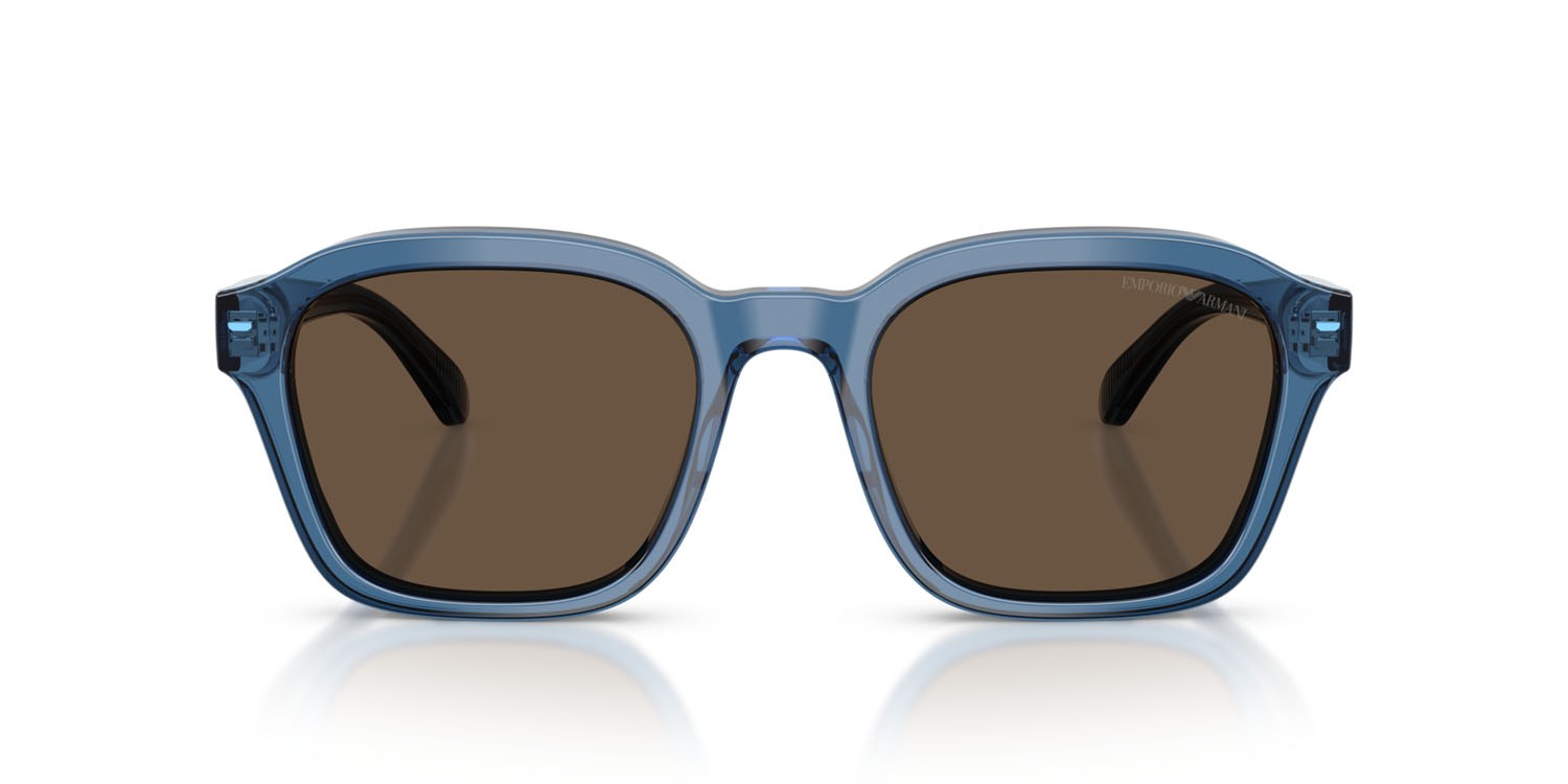Occhiali da sole Emporio Armani EA 4245U (624787) colore blu trasparente lucido forma irregolare lenti marrone tinta unita