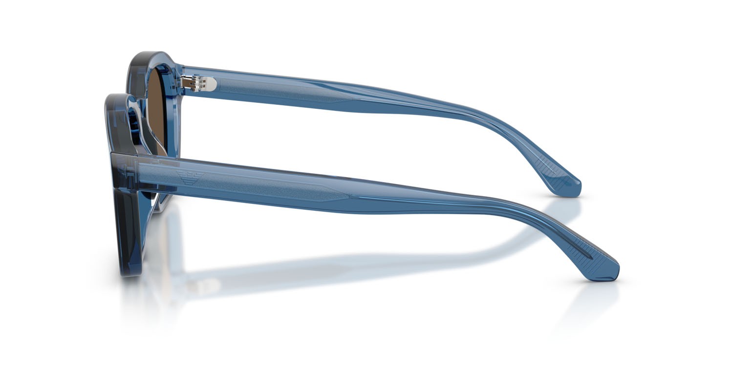 Occhiali da sole Emporio Armani EA 4245U (624787) colore blu trasparente lucido forma irregolare lenti marrone tinta unita