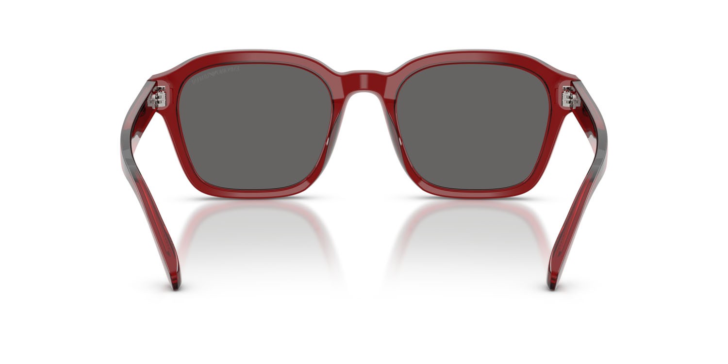 Occhiali da sole Emporio Armani EA 4245U (624887) colore rosso brillante trasparente forma irregolare lenti grigio