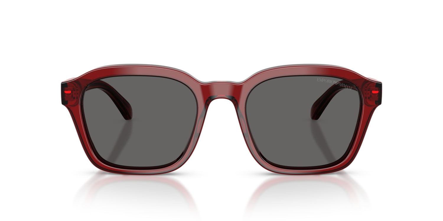 Occhiali da sole Emporio Armani EA 4245U (624887) colore rosso brillante trasparente forma irregolare lenti grigio