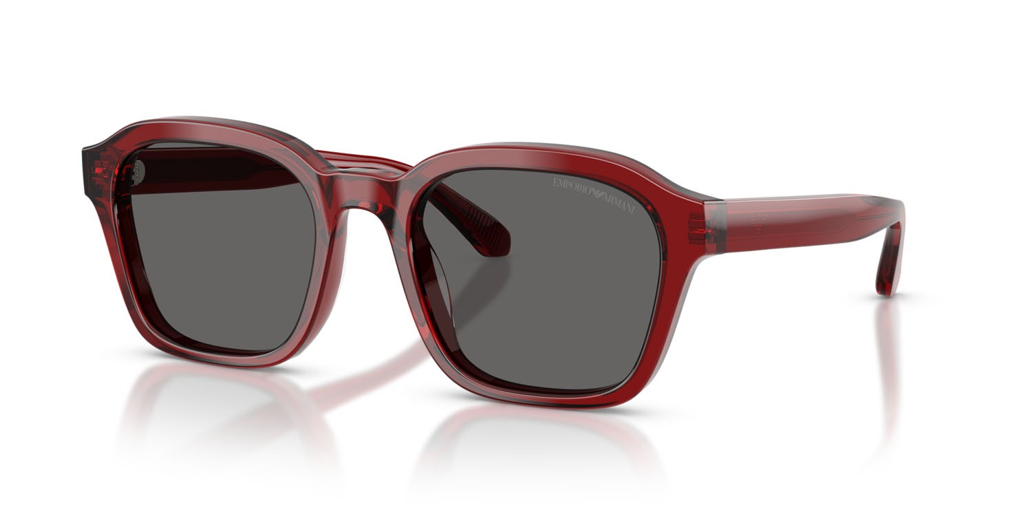 Occhiali da sole Emporio Armani EA 4245U (624887) colore rosso brillante trasparente forma irregolare lenti grigio