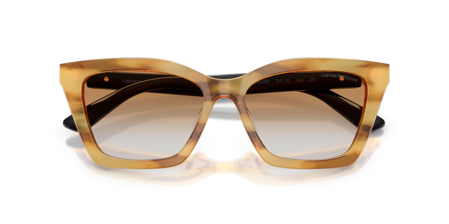 Occhiali da sole Emporio Armani EA 4250U (62692Q) colore miele a righe lucido forma farfalla lenti trasparente sfumato ocra