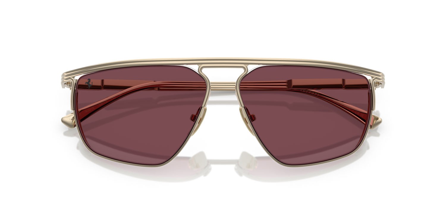 Occhiali da sole Ferrari FH 1013T (302/1E) colore oro pallido forma irregolare lenti bordeaux