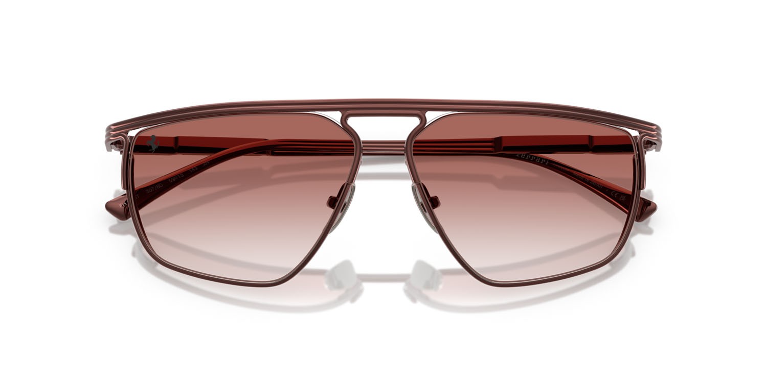 Occhiali da sole Ferrari FH 1013T (307/8D) colore bordeaux forma irregolare lenti bordeaux sfumato