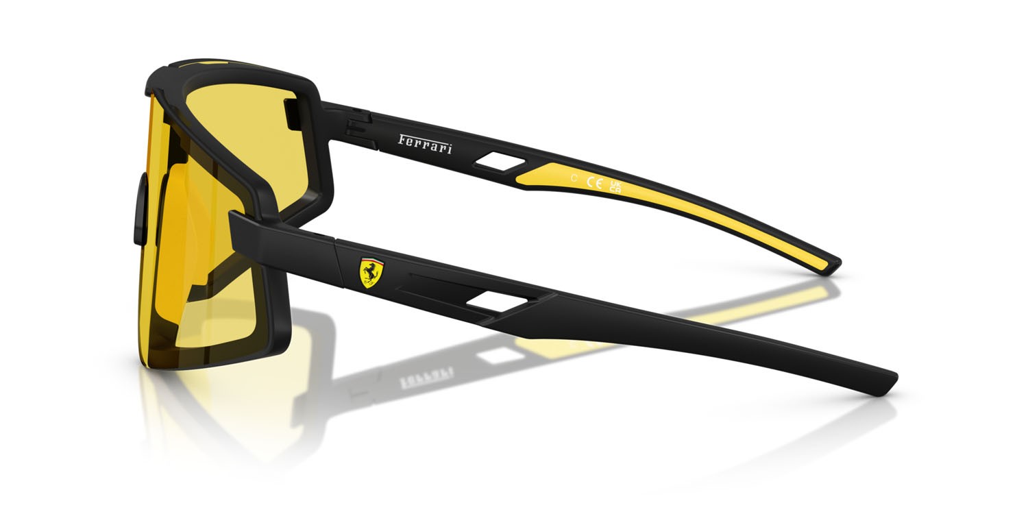 Occhiali da sole Ferrari Scuderia FZ 6009U (504/V9) colore nero opaco forma irregolare lenti giallo a specchio
