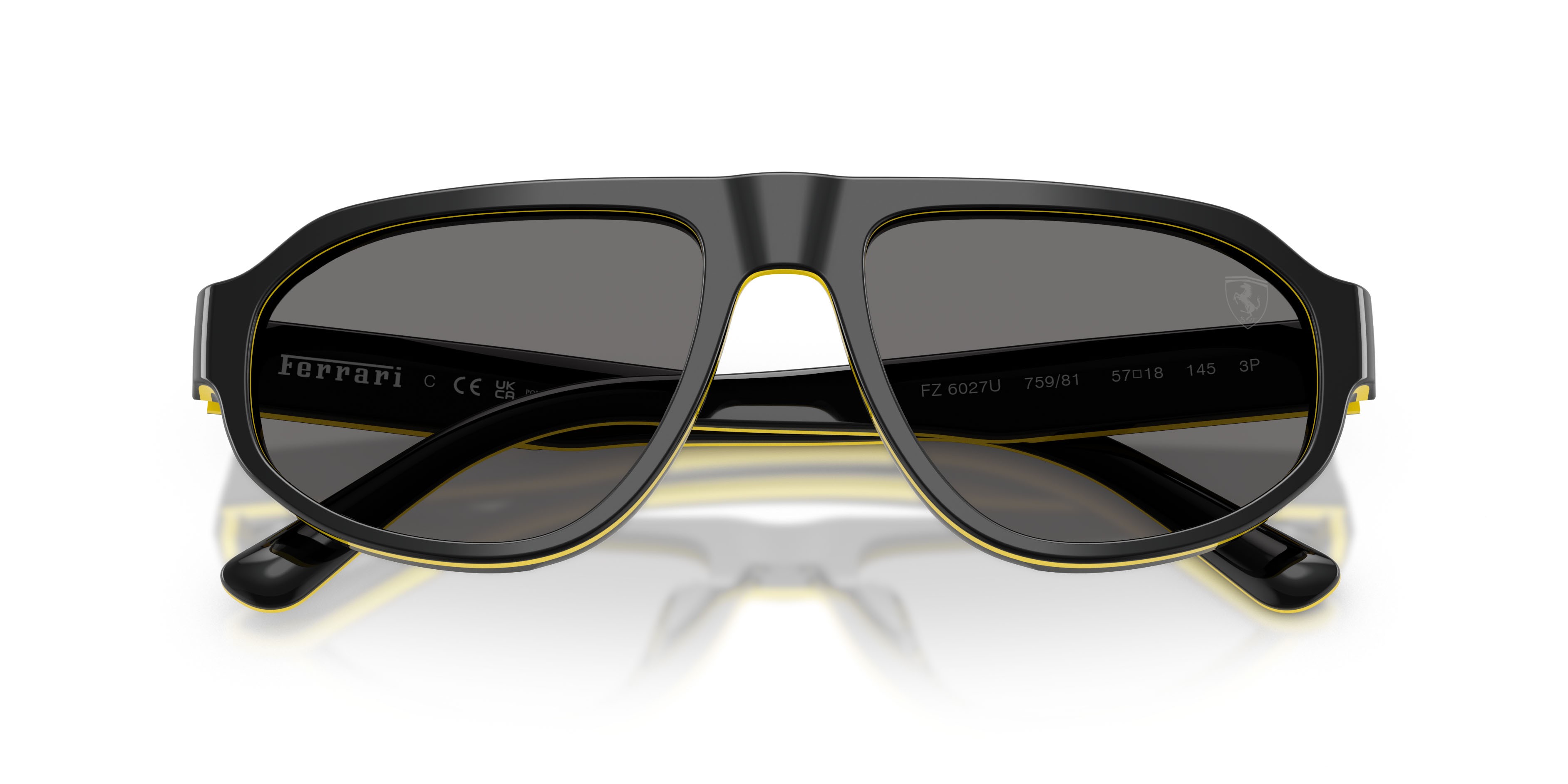 Occhiali da sole Ferrari Scuderia FZ 6027U (759/81) colore nero/giallo forma irregolare lenti polar grigio scuro