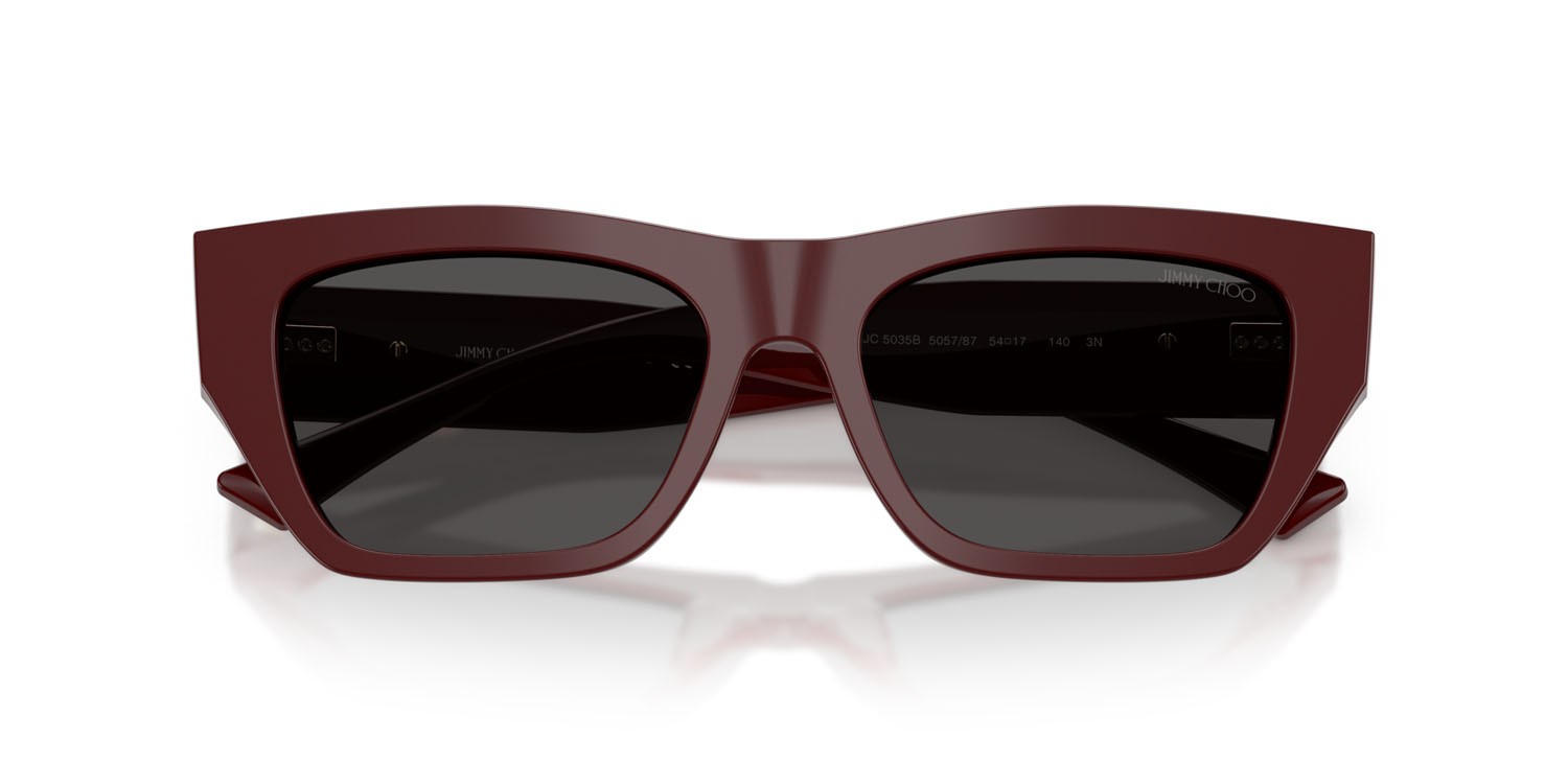 Occhiali da sole Jimmy Choo JC 5035B (505787) colore mirtillo rosso forma cat eye lenti grigio scuro