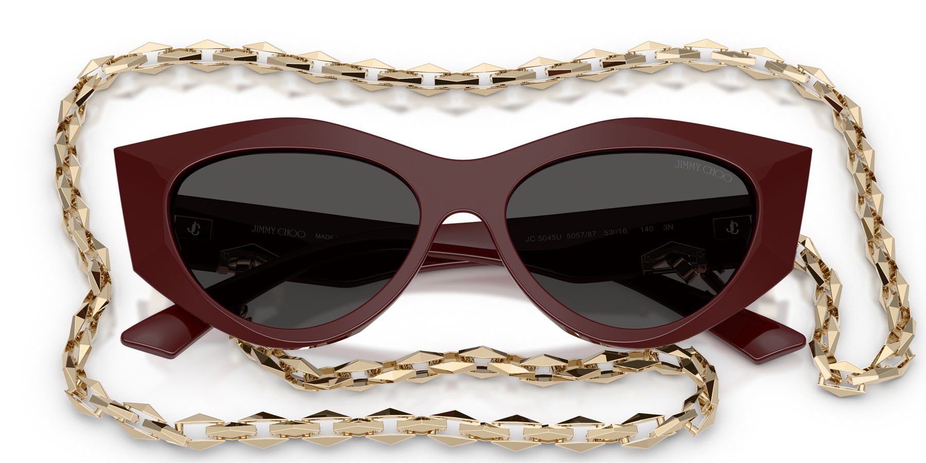 Occhiali da sole Jimmy Choo JC 5045U (505787) colore mirtillo rosso forma cat eye lenti grigio scuro