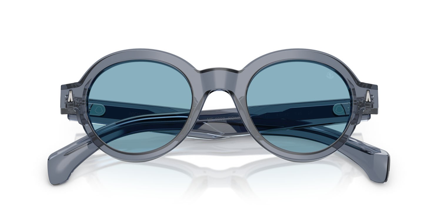 Occhiali da sole Moncler Rondosa ME 6003 (300T72) colore blu trasparente lucido forma rotondo lenti fotocromatica azzurro
