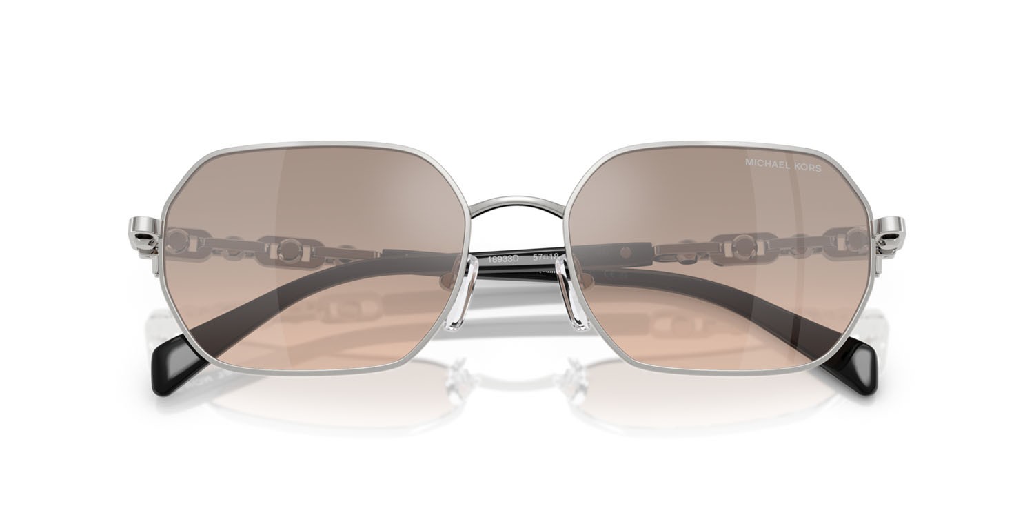 Occhiali da sole Michael Kors Saint Martin MK 1165 (18933D) colore argento lucido forma irregolare lenti kaki argento sfumato