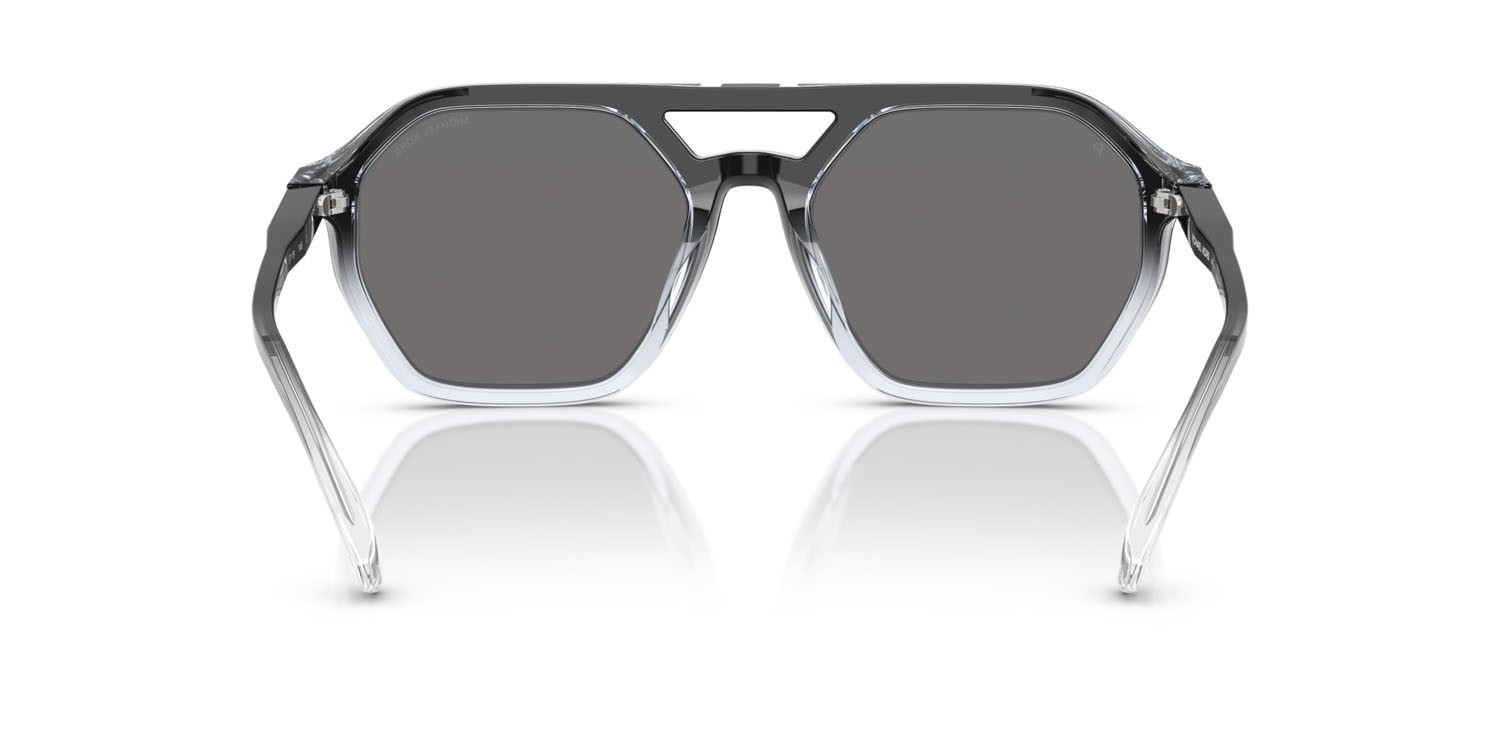 Occhiali da sole Michael Kors Jackson Hole MK 2251U (401381) colore nero trasparente sfumato forma aviator lenti polarizzata grigio scuro tinta unita