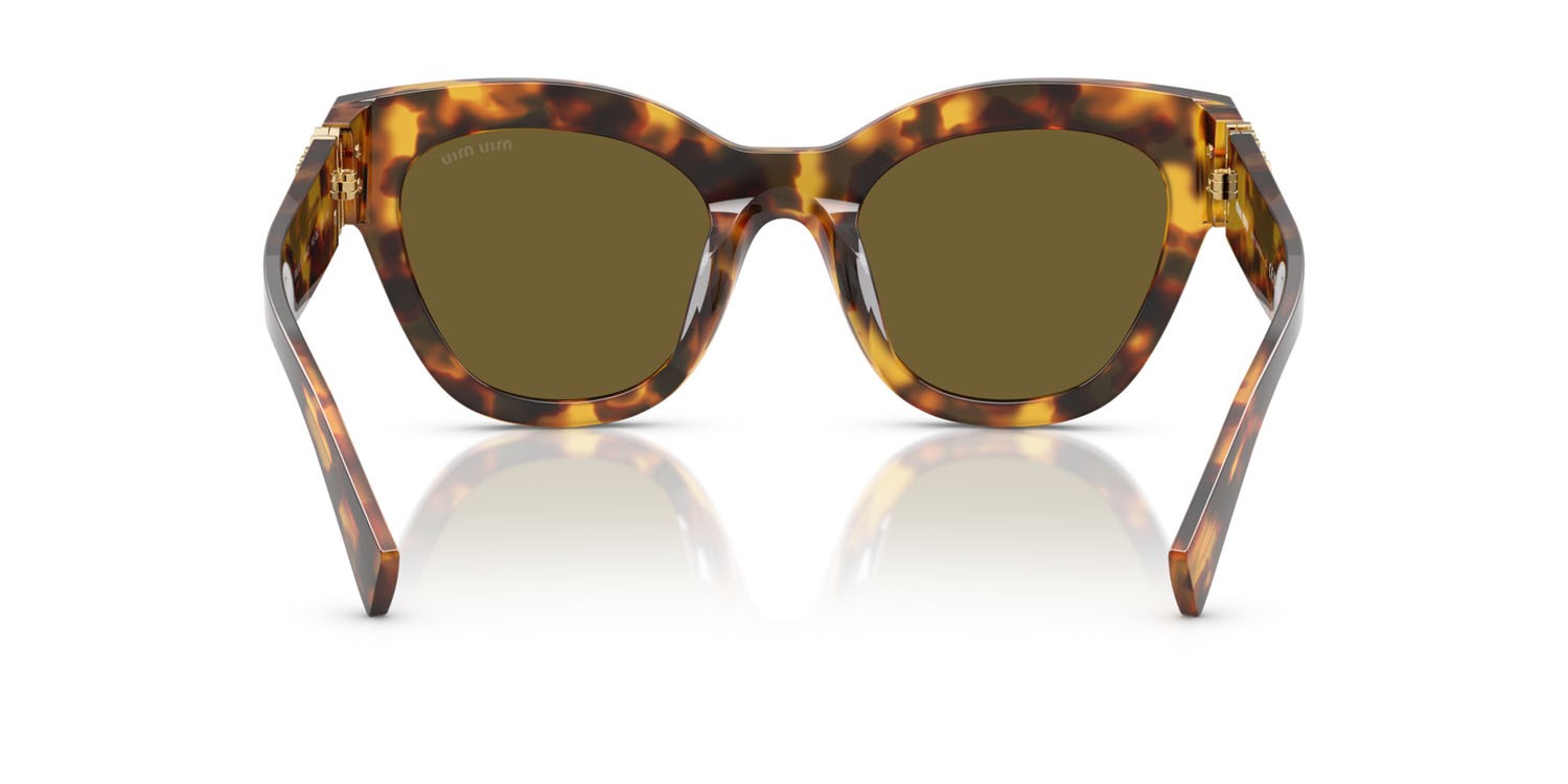 Occhiali da sole Miu Miu MU 01YS (14L09Z) colore havana miele forma quadrato lenti marrone scuro