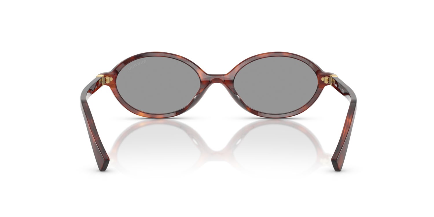 Occhiali da sole Miu Miu MU 04ZS (21C40O) colore havana mahogany forma ovale lenti grigio