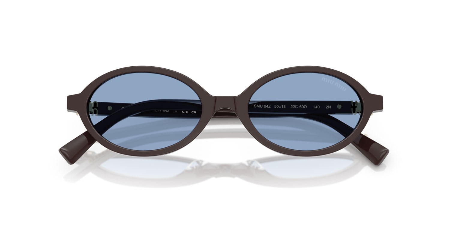 Occhiali da sole Miu Miu MU 04ZS (22C60O) colore moka forma ovale lenti azzurro
