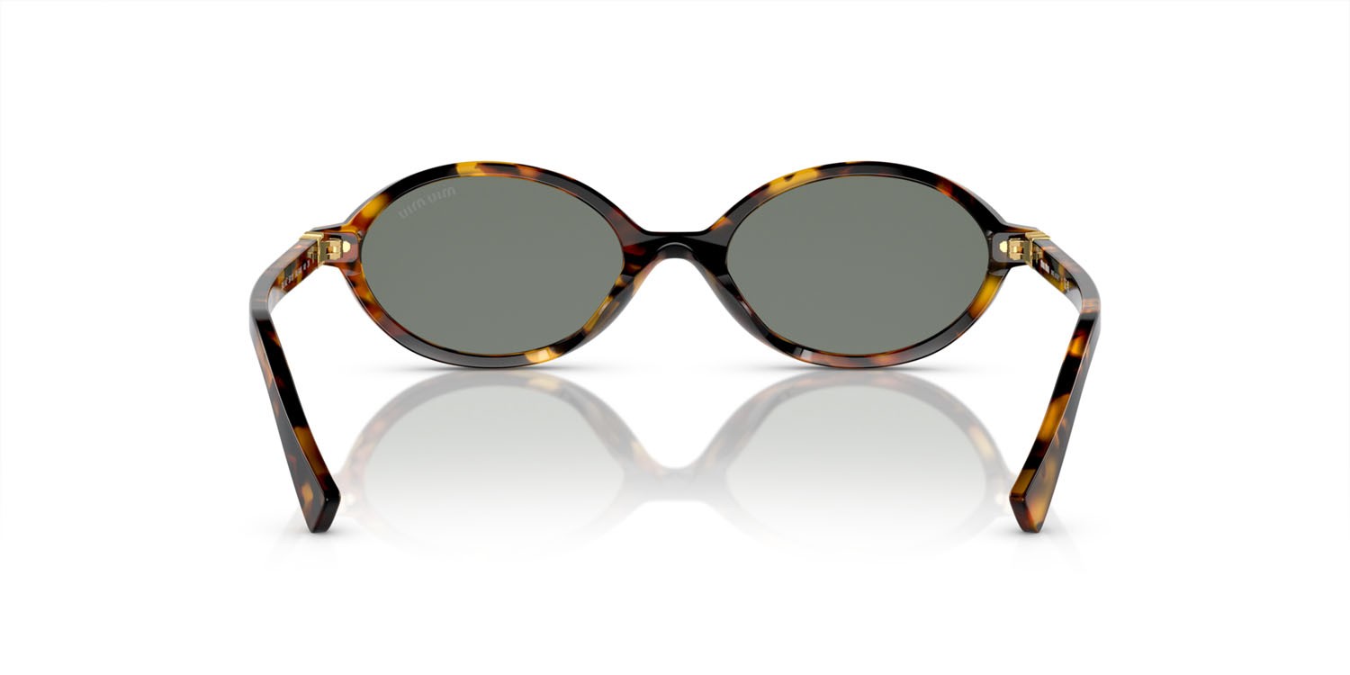 Occhiali da sole Miu Miu MU 04ZS (VAU04M) colore havana miele forma ovale lenti verde con specchiatura argento interna