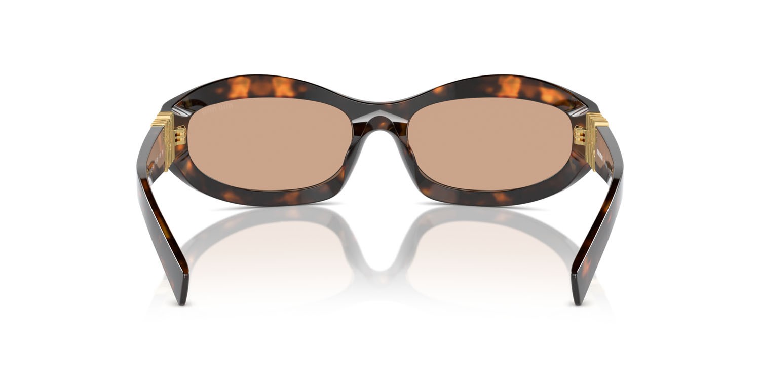 Occhiali da sole Miu Miu MU 14ZS (14L90H) colore havana miele forma irregolare lenti marrone scuro