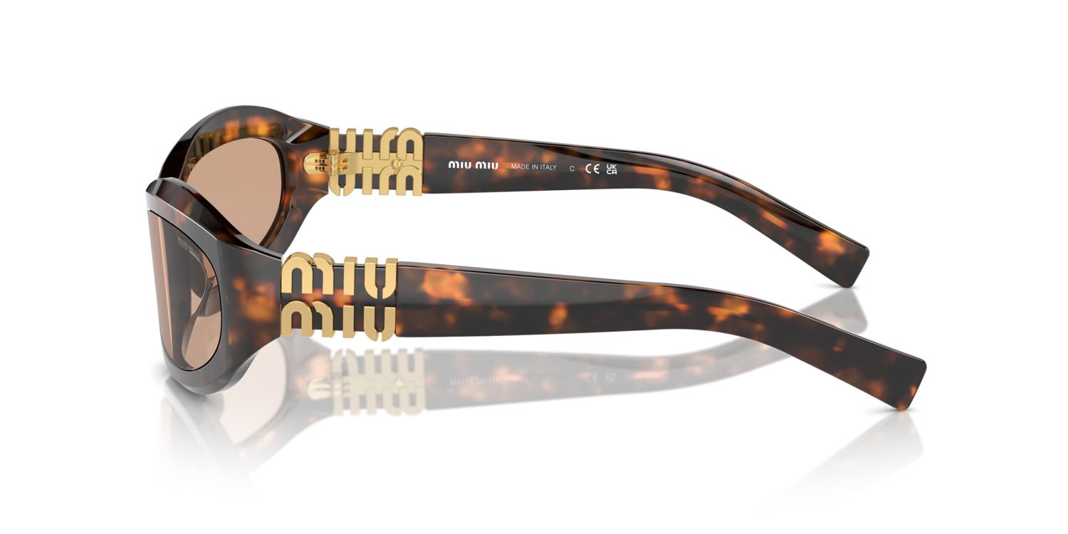 Occhiali da sole Miu Miu MU 14ZS (14L90H) colore havana miele forma irregolare lenti marrone scuro