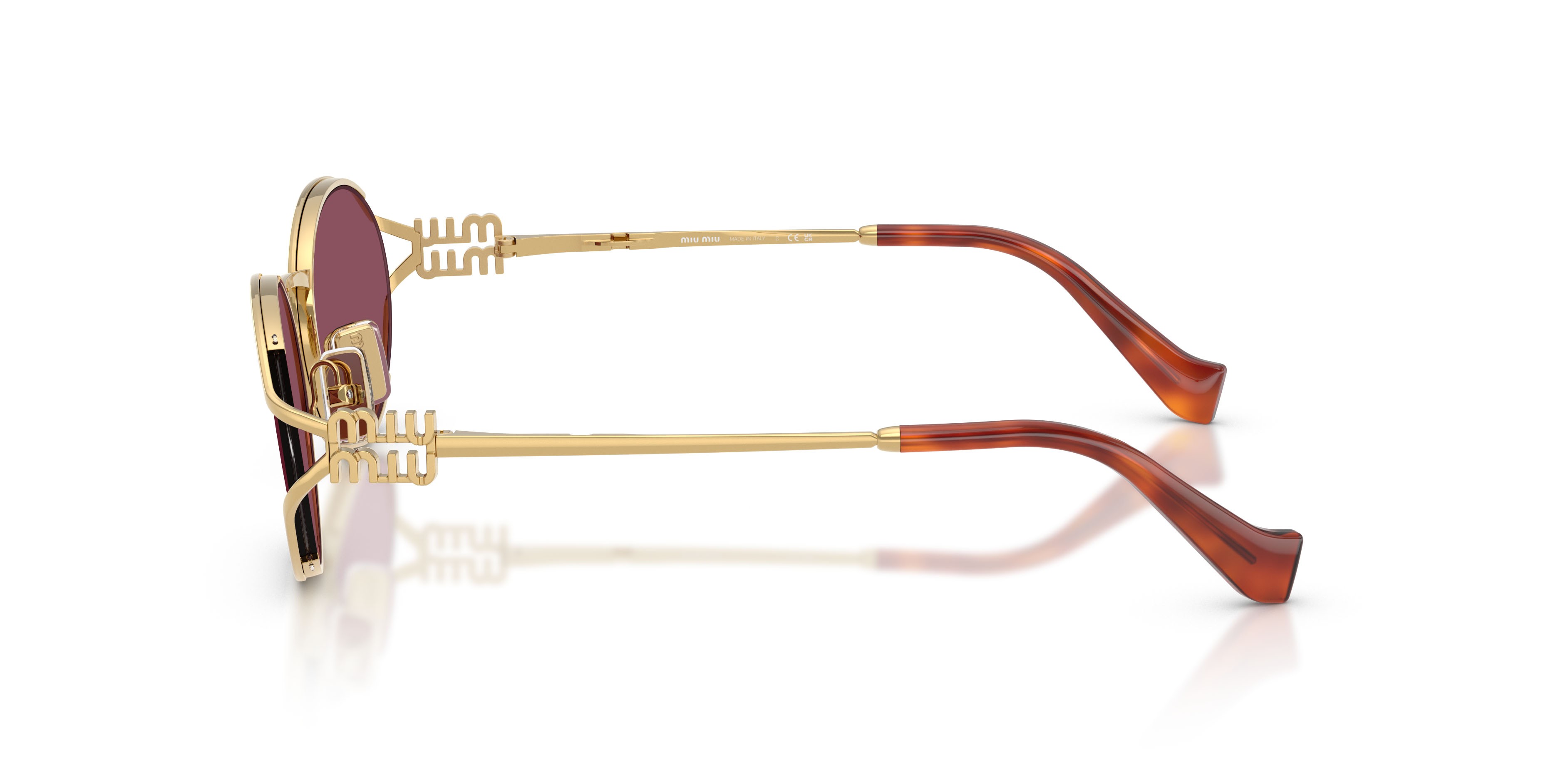 Occhiali da sole Miu Miu MU 52YS (5AK20Y) colore oro forma ovale lenti violetto scuro
