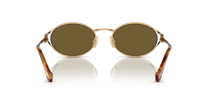 Occhiali da sole Miu Miu MU 52YS (7OE01T) colore brass gold forma ovale lenti marrone scuro