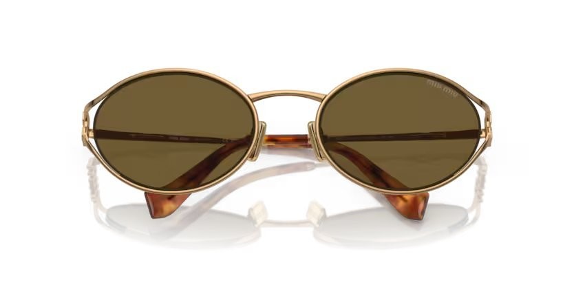 Occhiali da sole Miu Miu MU 52YS (7OE01T) colore brass gold forma ovale lenti marrone scuro