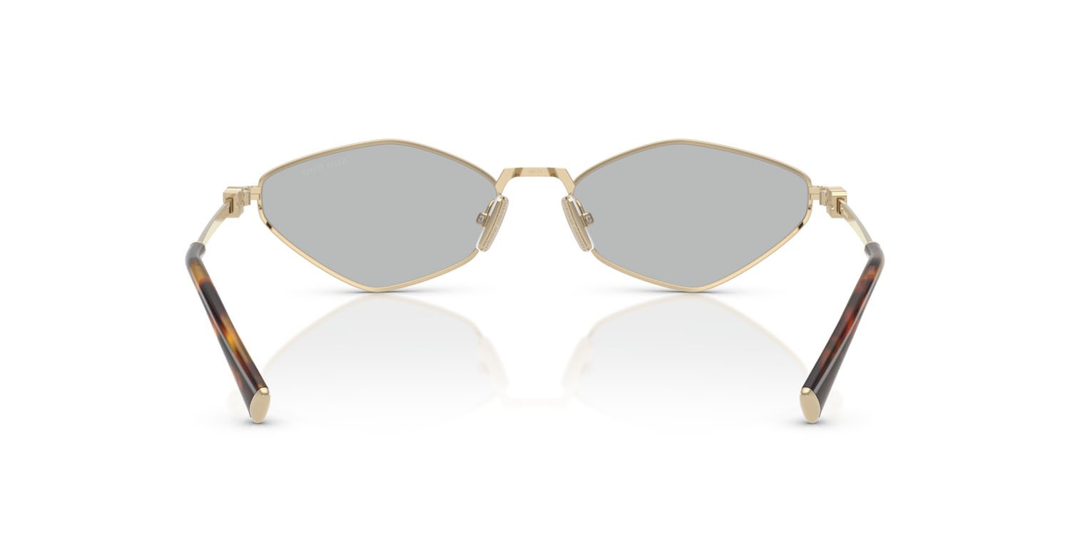Occhiali da sole Miu Miu MU 56ZS (ZVN50K) colore oro pallido forma irregolare lenti grigio chiaro