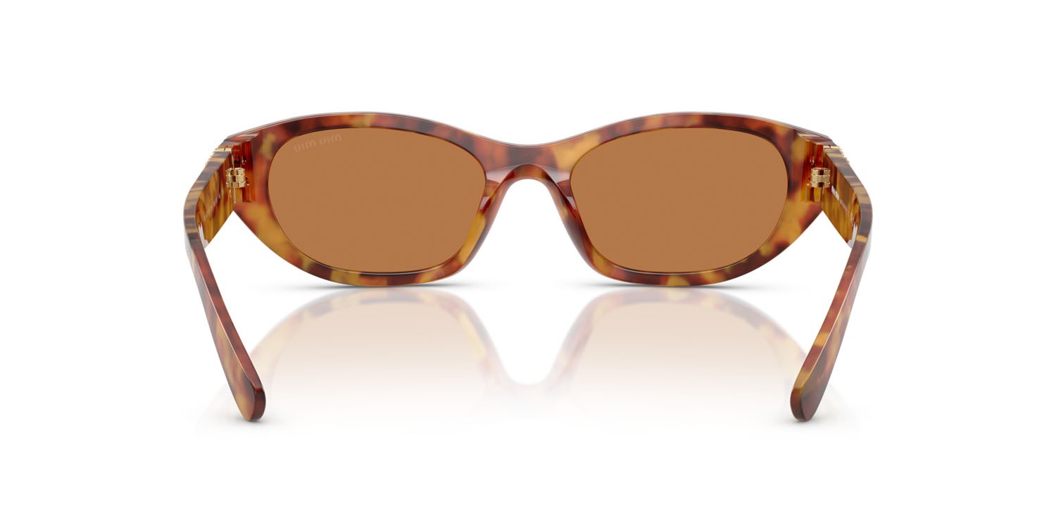 Occhiali da sole Miu Miu MU A03S (10L10I) colore havana chiaro forma irregolare lenti marrone
