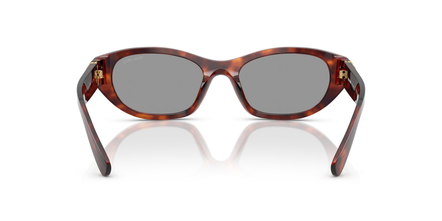 Occhiali da sole Miu Miu MU A03S (21C40O) colore havana mahogany forma irregolare lenti grigio