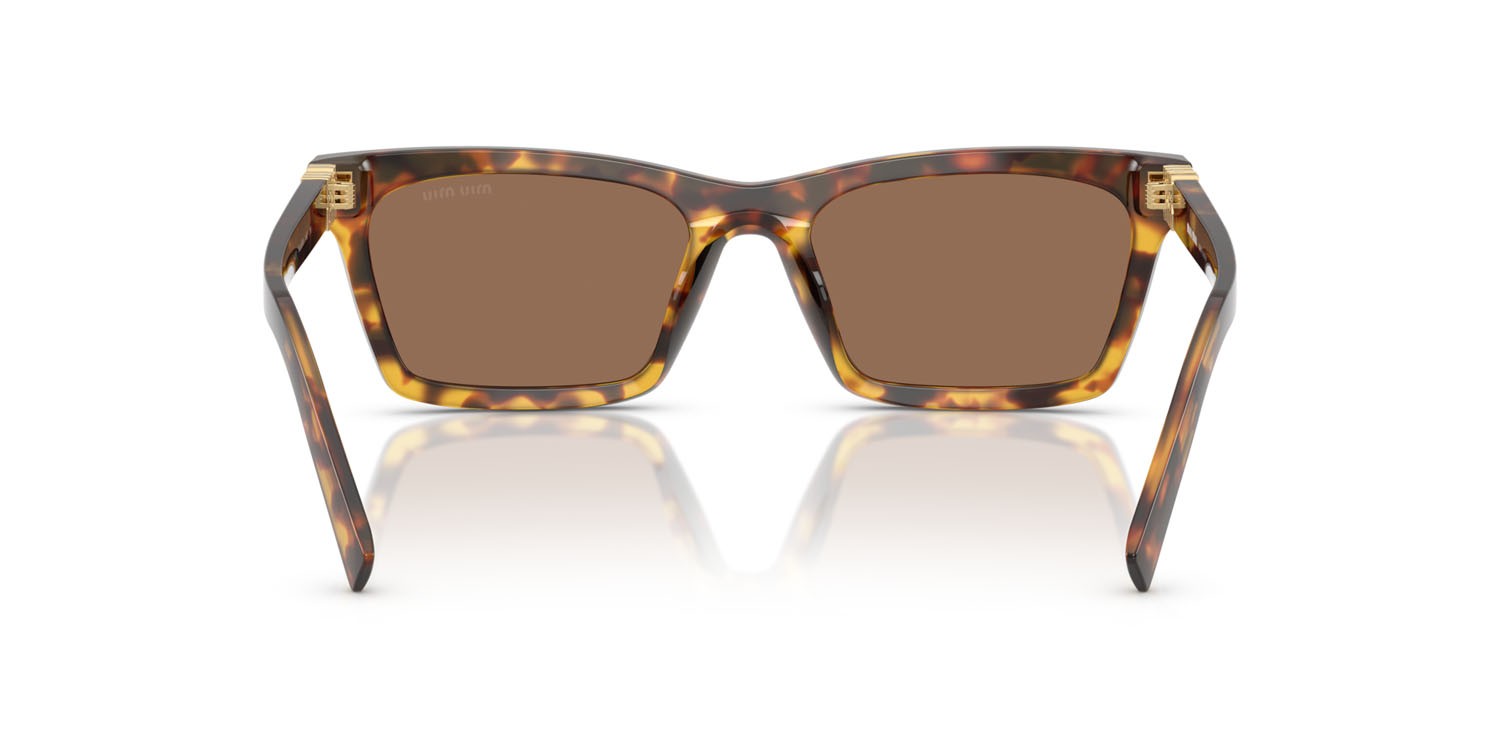Occhiali da sole Miu Miu MU A05S (14L60M) colore havana miele forma rettangolare lenti marrone scuro