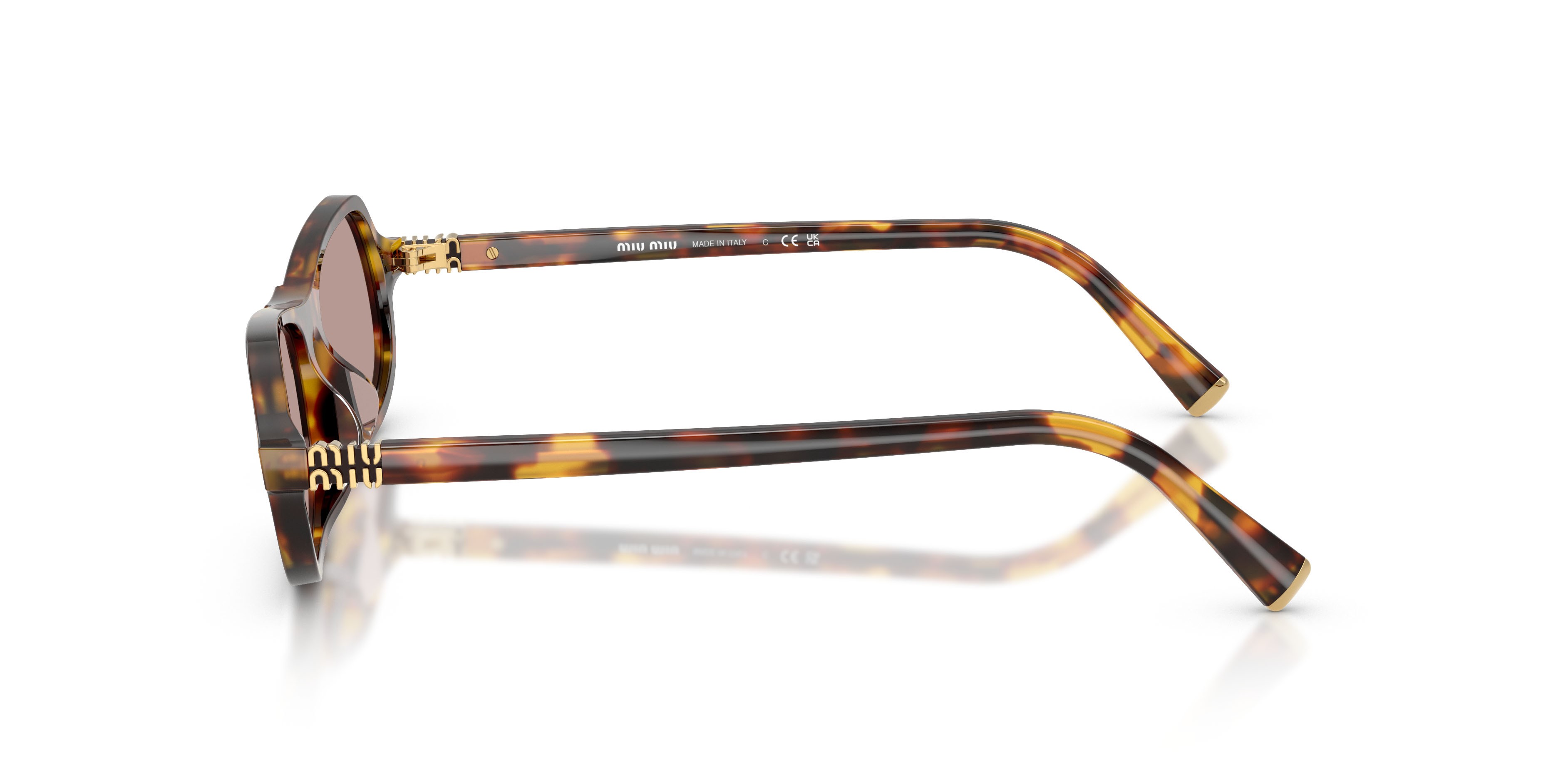 Occhiali da sole Miu Miu MU B10SU (14L20I) colore havana miele forma irregolare lenti viola chiaro/marrone