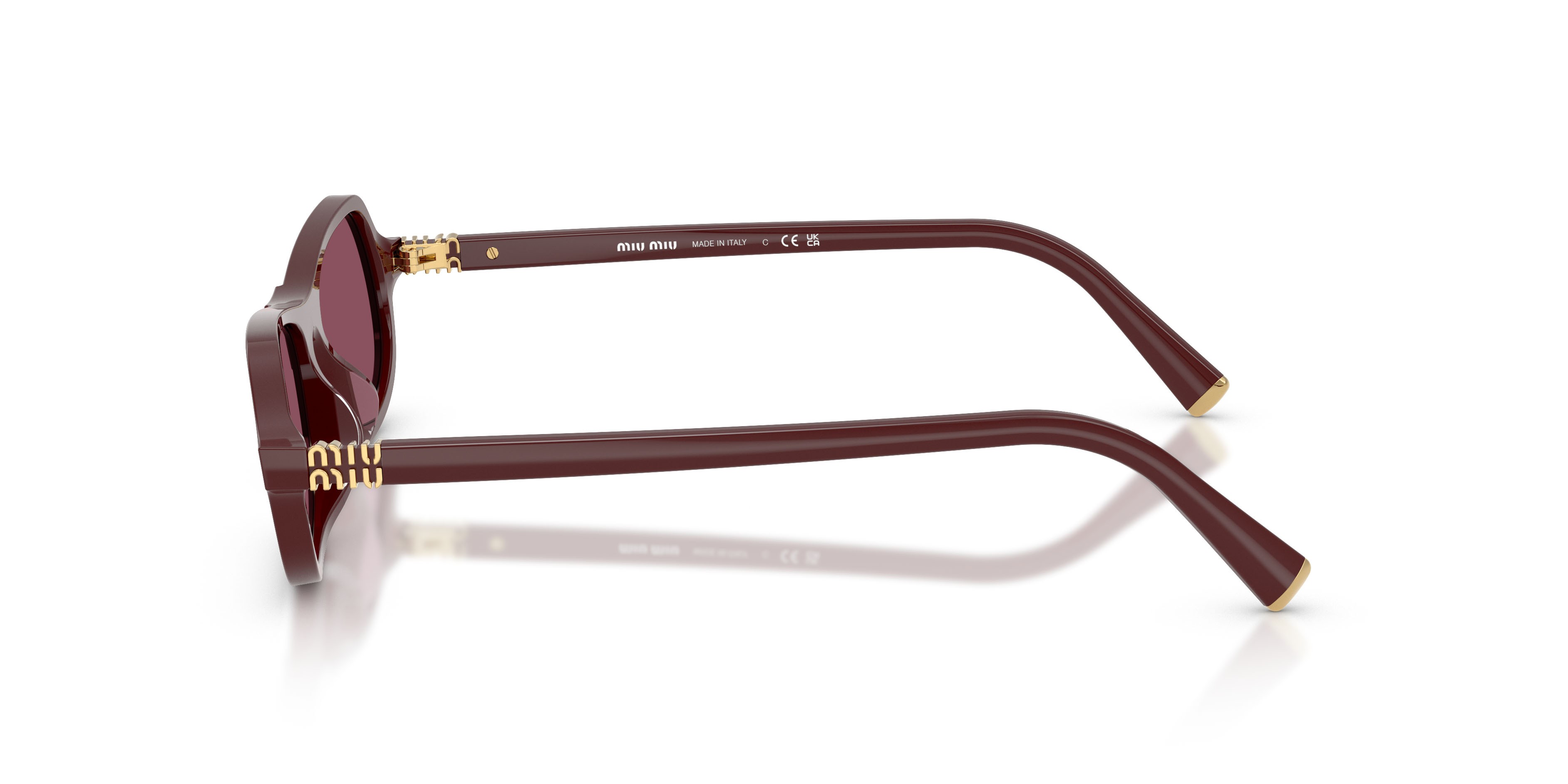 Occhiali da sole Miu Miu MU B10SU (26L20Y) colore rosso ciliegia forma irregolare lenti violetto scuro