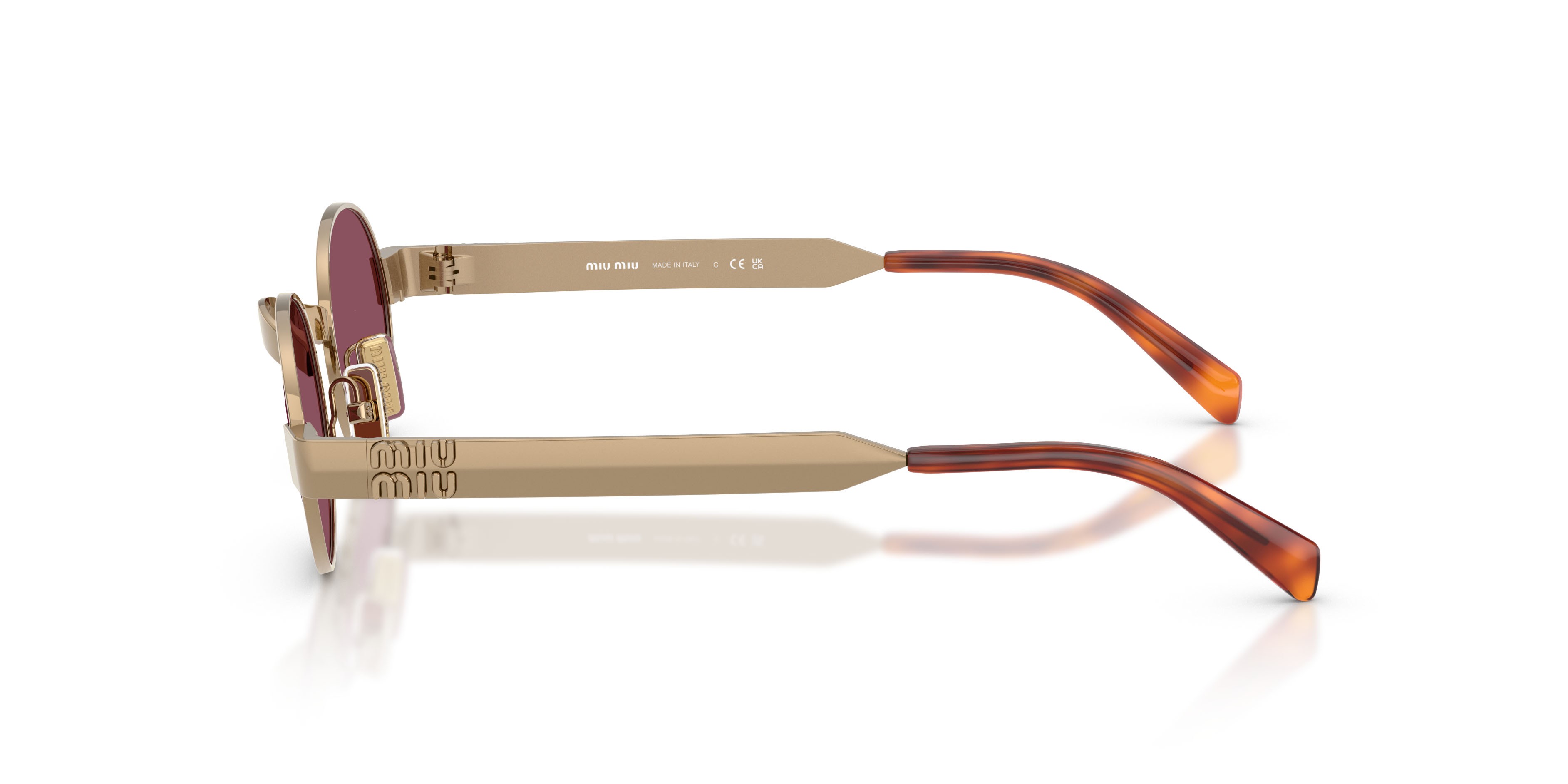 Occhiali da sole Miu Miu MU B51S (7OE30Y) colore ottone forma ovale lenti violetto scuro