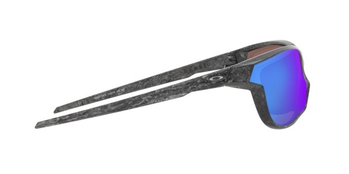 Occhiali da sole Oakley Kaast OO 9227 (922705) colore verve spacedust forma ovale lenti prizm sapphire