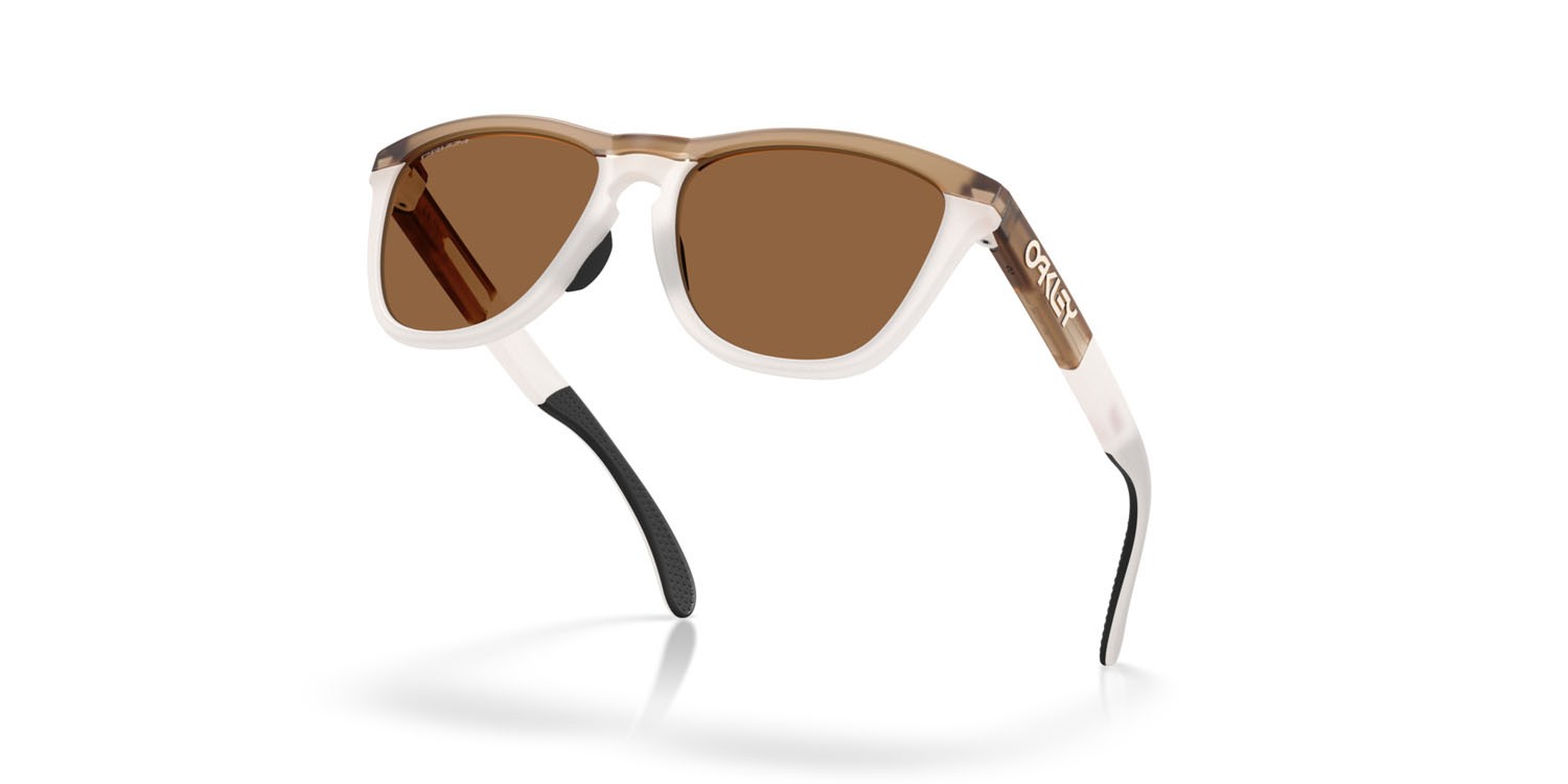Sonnenbrillen Oakley Frogskins Range OO 9284 (928420) farbe seppia opaco form rund gläser prizm bronze