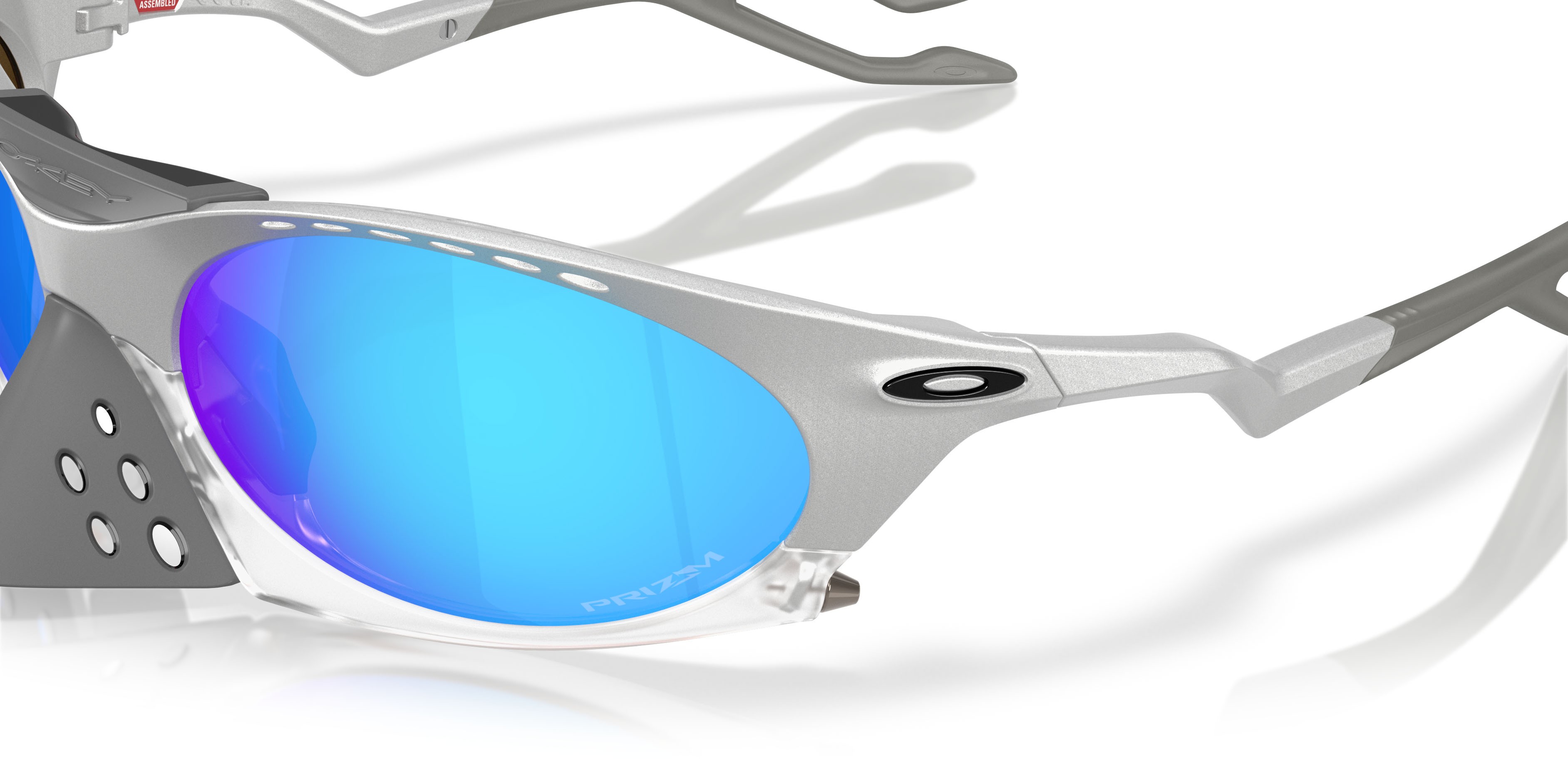 Sonnenbrillen Oakley Plantaris OO 9437 (943713) farbe x-silver form oval gläser prizm sapphire