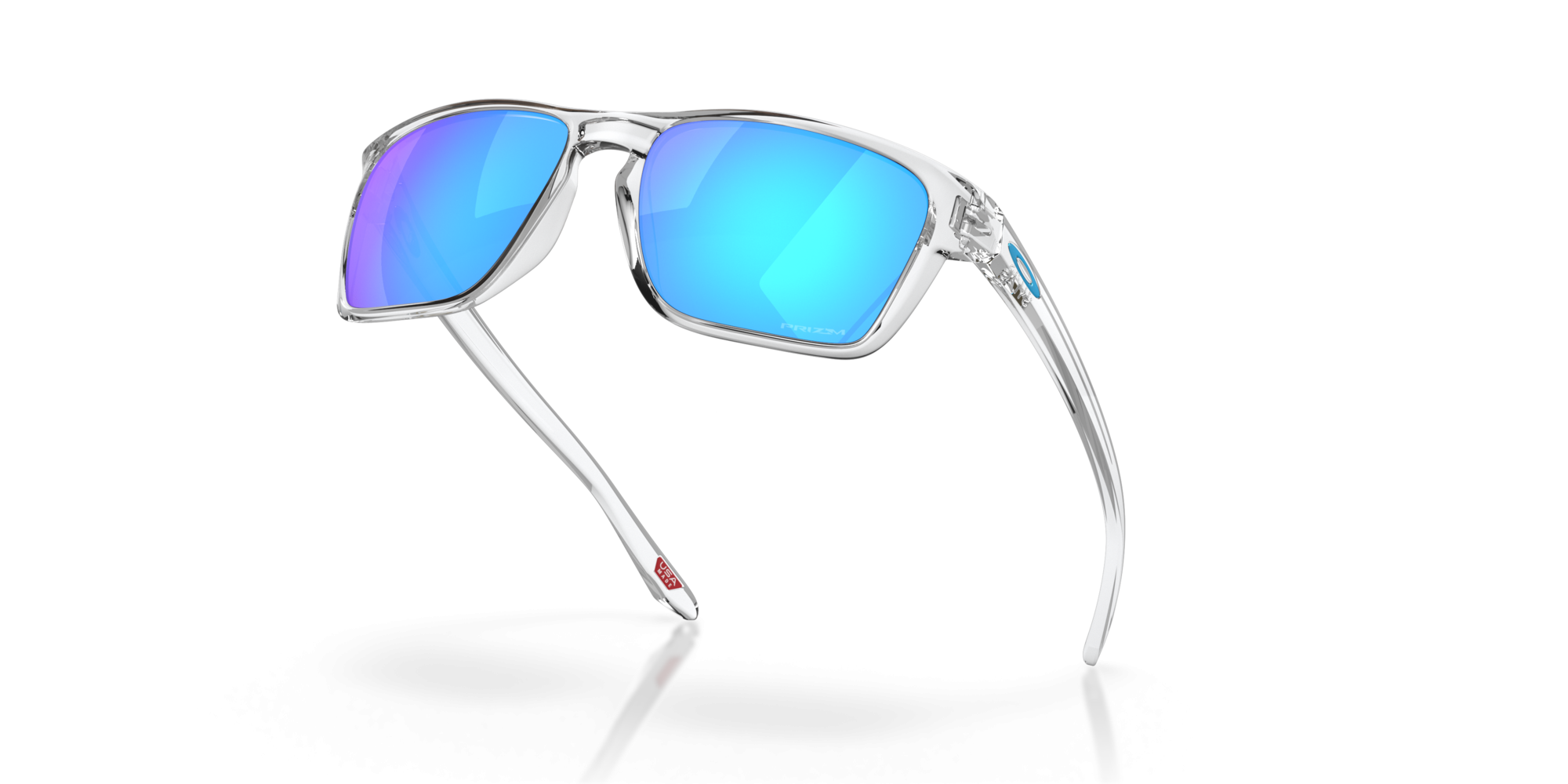 Occhiali da sole Oakley Sylas OO 9448 (944804) colore polished clear forma rettangolare lenti prizm sapphire
