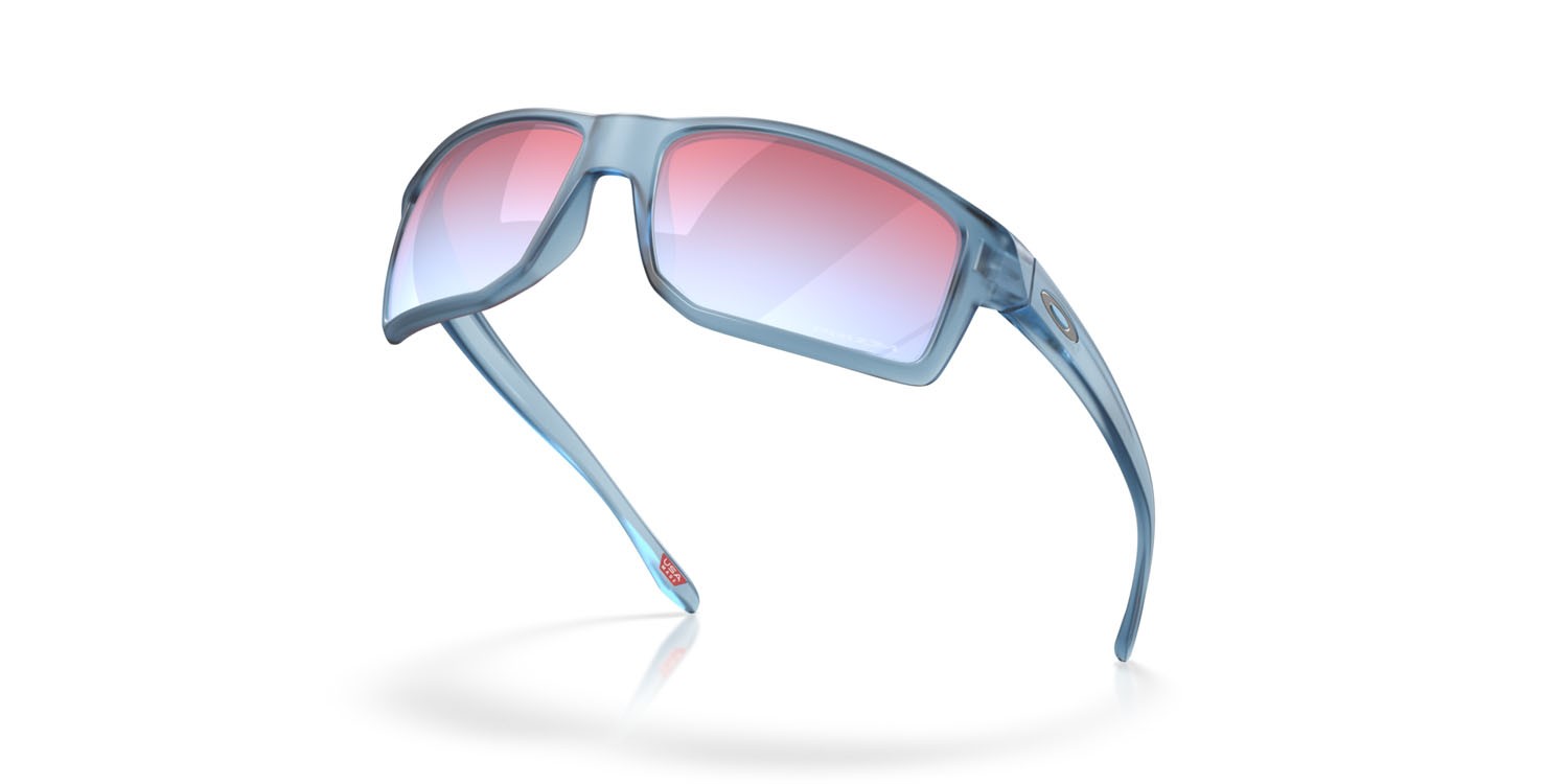Occhiali da sole Oakley Gibston OO 9449 (944925) colore stonewash trasparente opaco forma rettangolare lenti prizm snow sapphire