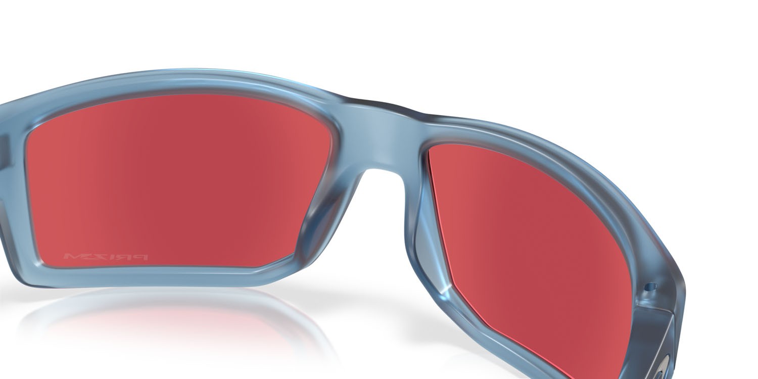 Occhiali da sole Oakley Gibston OO 9449 (944925) colore stonewash trasparente opaco forma rettangolare lenti prizm snow sapphire