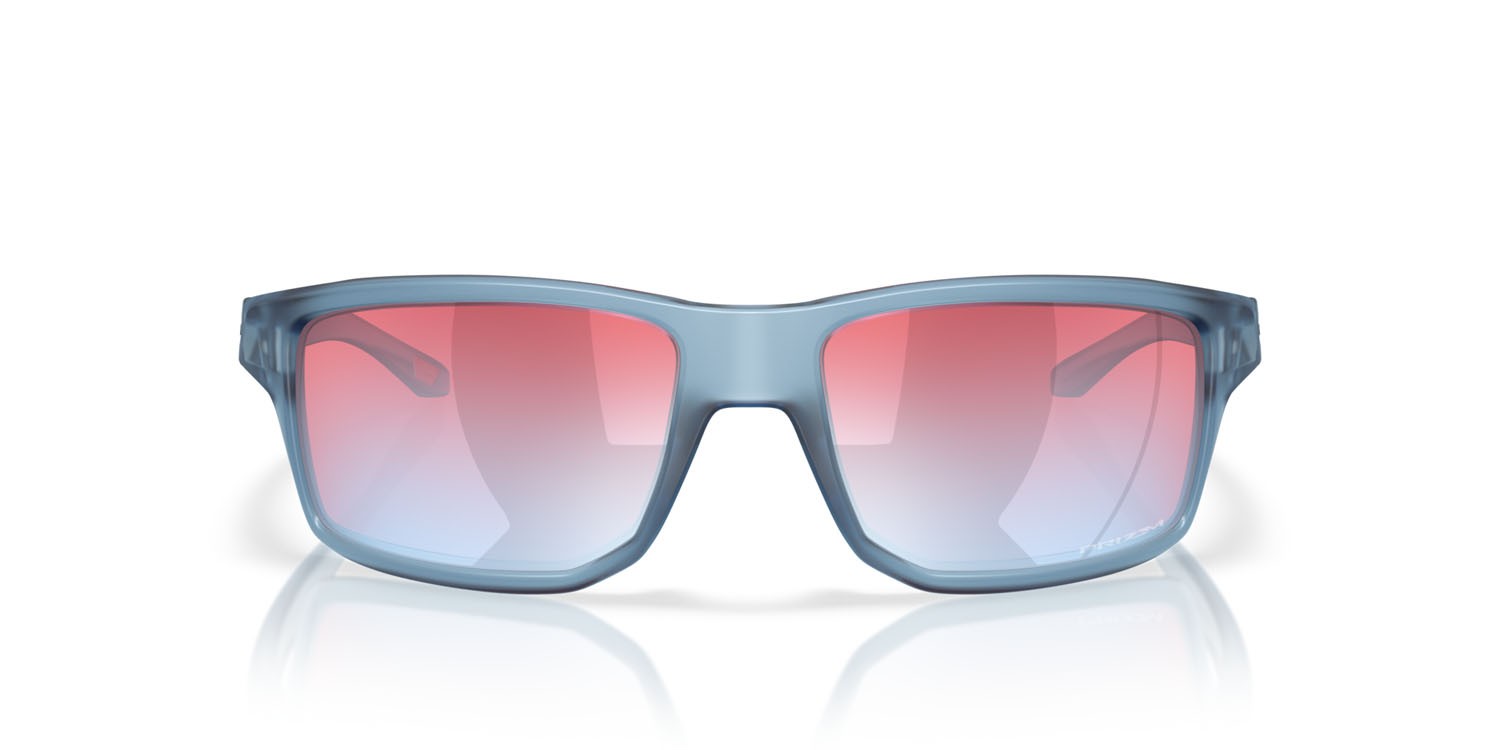 Occhiali da sole Oakley Gibston OO 9449 (944925) colore stonewash trasparente opaco forma rettangolare lenti prizm snow sapphire