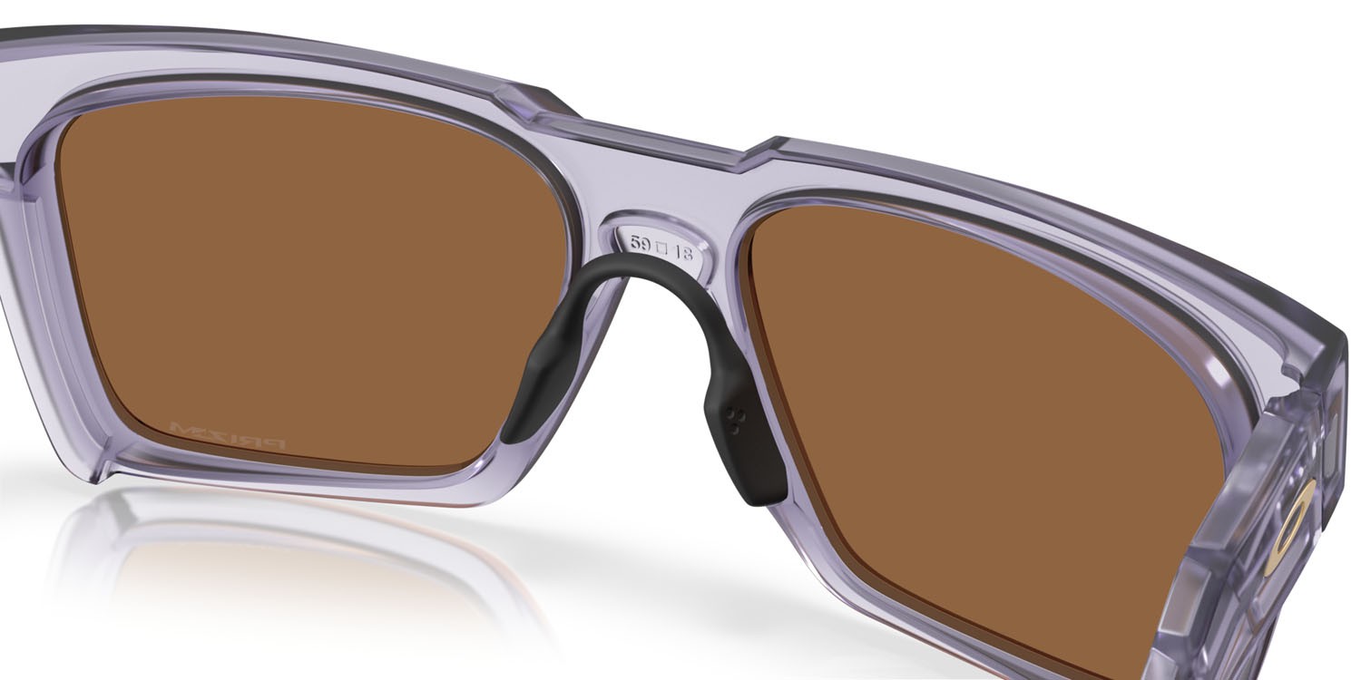 Occhiali da sole Oakley Enigma Ink OO 9485 (948506) colore lilla opaco traslucido forma quadrato lenti prizm bronze