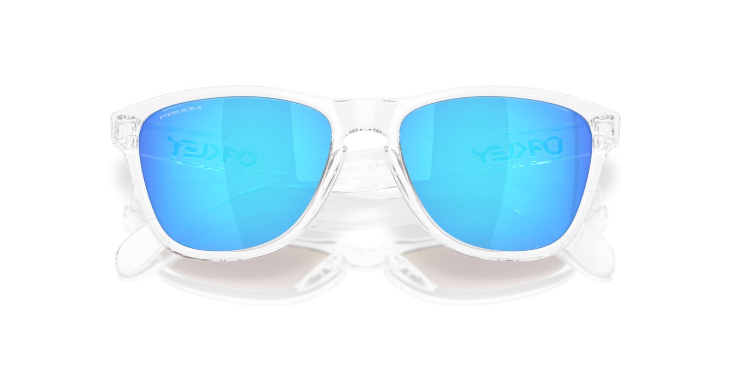 Occhiali da sole Oakley Frogskins S OO 9508 (950801) colore trasparente lucido forma rotondo lenti prizm sapphire